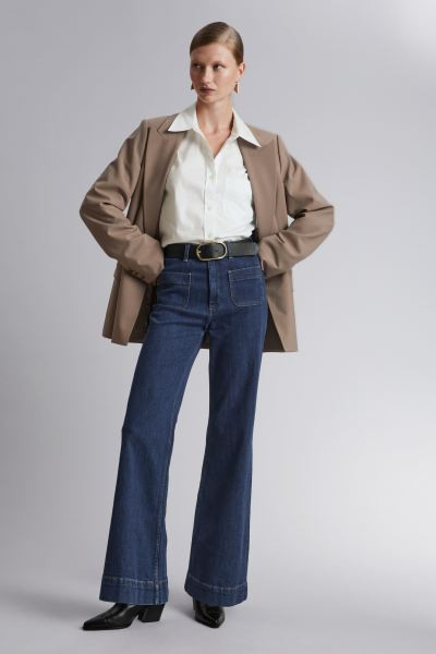 Wijd uitlopende jeans | H&M (DE, AT, CH, NL, FI)