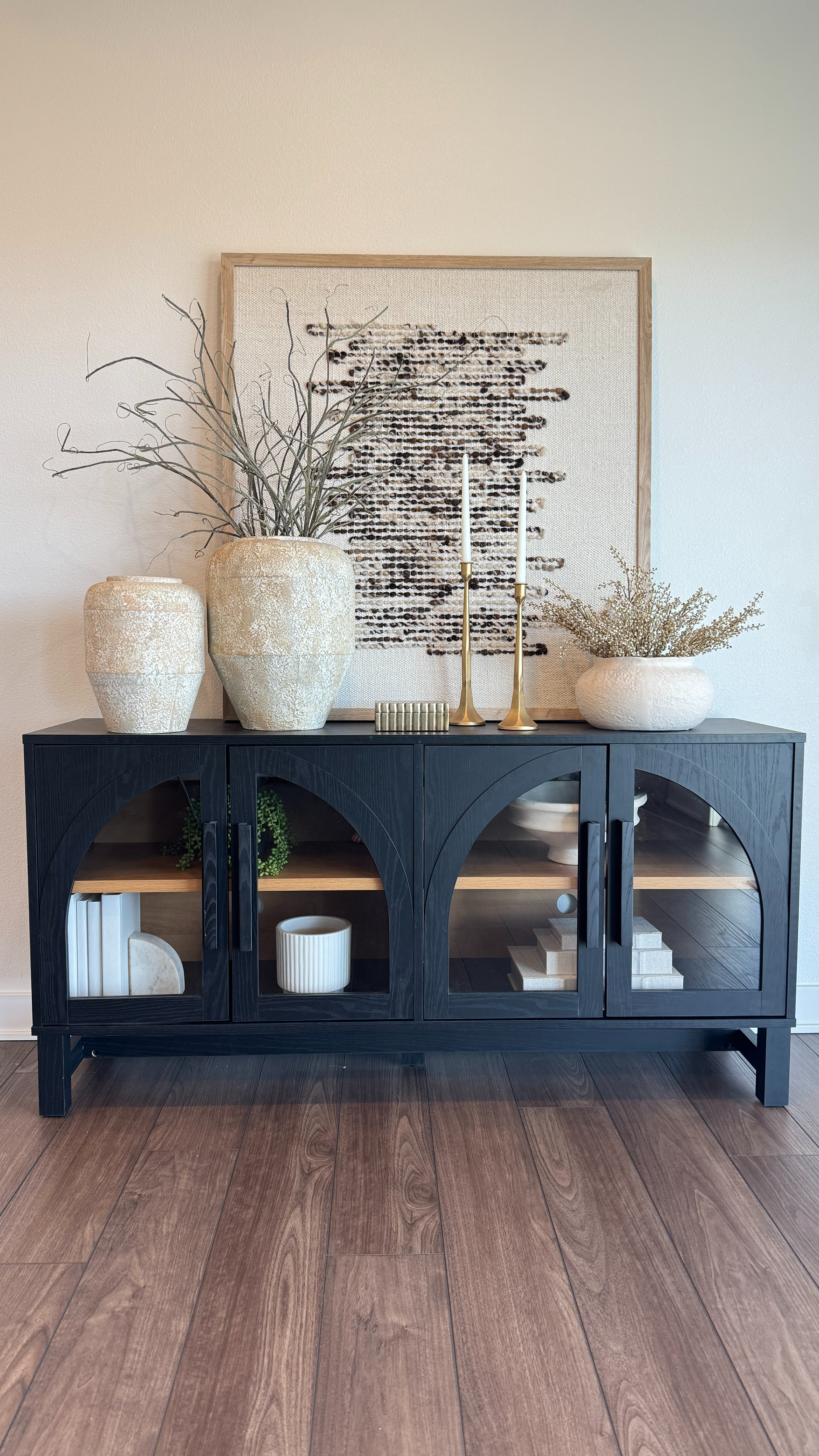You guys always ask about this piece ✨ This textured wall art is on sale and it’s such an easy way to elevate a room. I love it styled on my black cabinet with neutral vases, stems, candles and books. 

 

#LTKHome #LTKSaleAlert