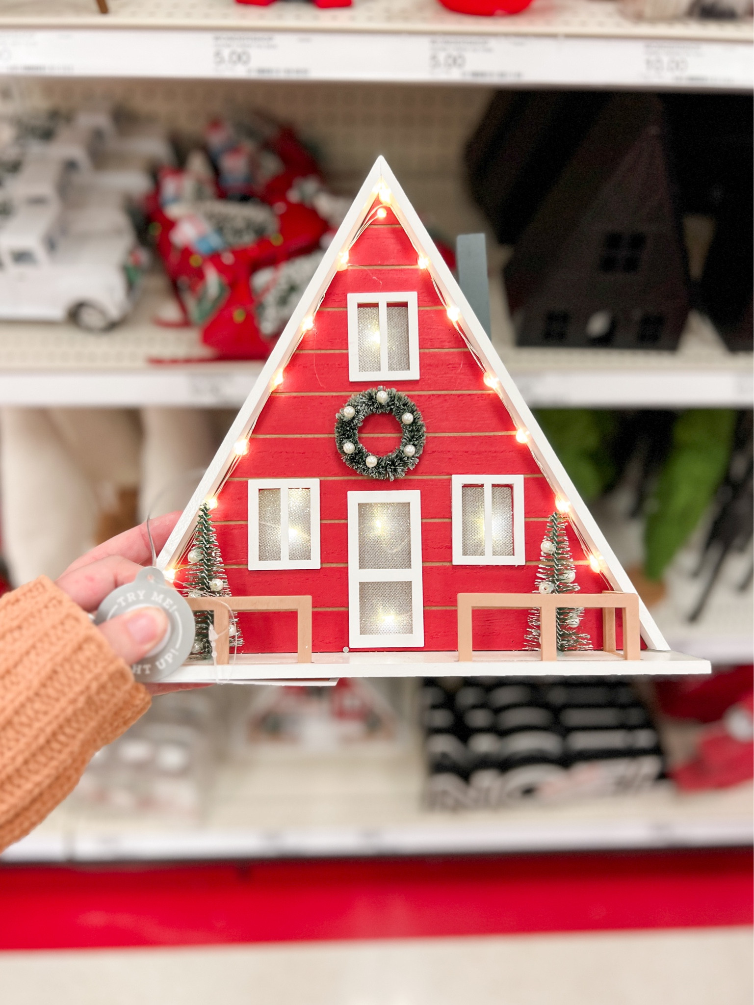 OH EM GEE. As soon as I saw this little battery light up aframe cabin Christmas decoration I knew I had to have it!! I have always loved something about a frame cabins and this is going to look adorable on my tv stand stand this year 

Target Christmas decor, Christmas decorations, Christmas decor 2023

#LTKhome #LTKSeasonal #LTKHoliday