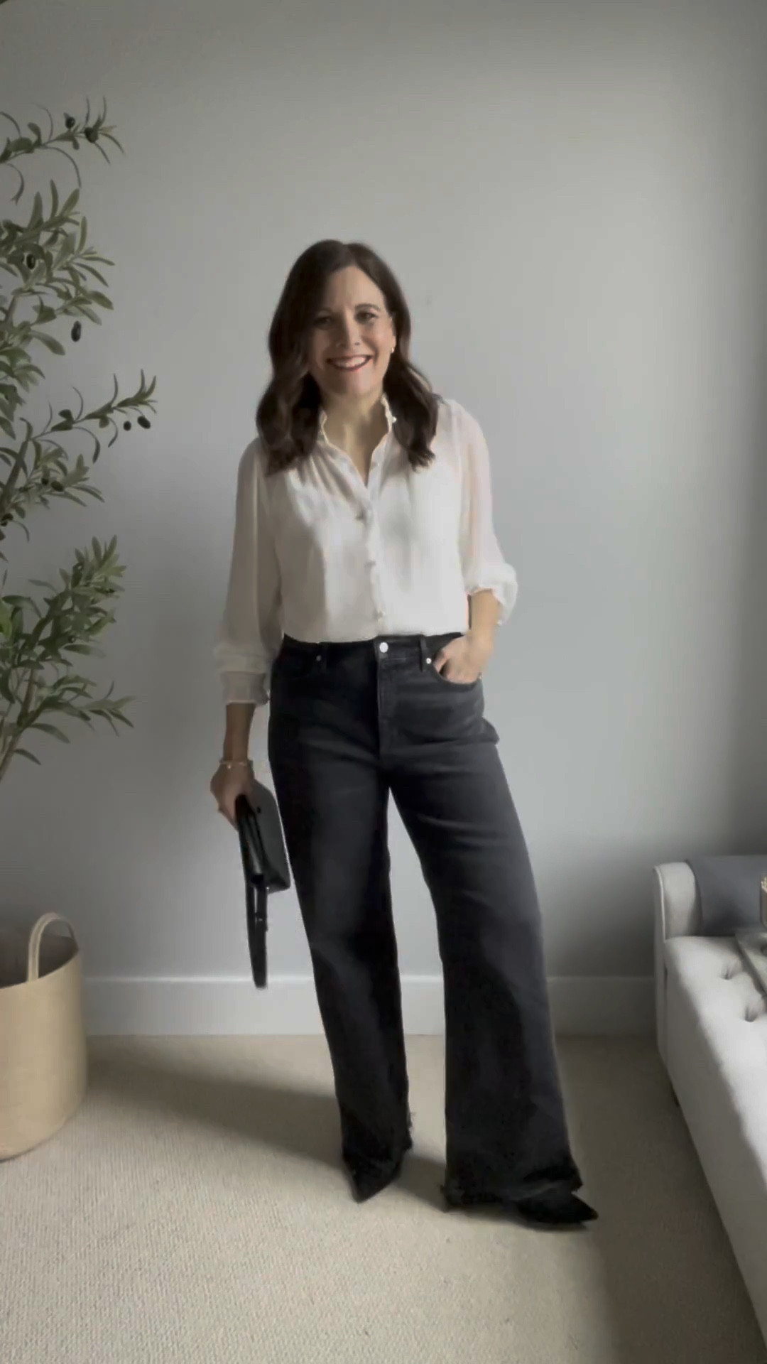 I’ve been looking for a gorgeous cream ruffleneck blouse ever since I saw Cameron Diaz in The Holiday wearing one to lunch with Jude Law. It’s easy to underestimate this blouse, but the pearl buttons and filmy fabric elevate it. It comes with a detachable black tie you can add for a contrasting black-and-cream look. It fits true to size, and I’m in a small. I’m wearing it with a regular nude bra. On the bottom, I’m wearing LOFT black wide leg jeans in my true size, they fit relaxed and have a slight gap at the back of the waist. I may trim an inch off the raw hem to shorten the length.
 

 

#LTKCyberWeek 

#LTKHoliday #LTKOver40