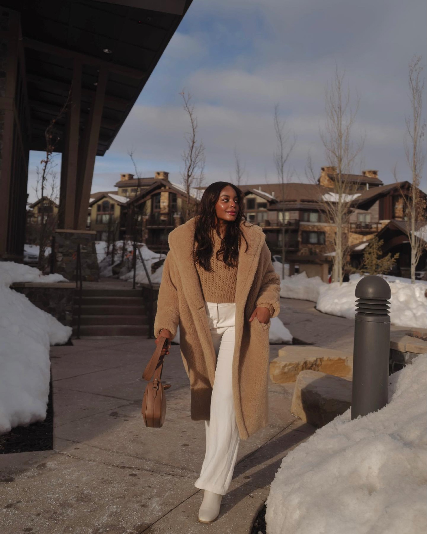 Cozy winter outfit in the max Mara teddy bear coat, brown cable knit sweater, white trousers, white boots, embossed leather bag - outfit linked below! 

#winterstyle #winterfashion #trends #ootd #coats 

#LTKtravel #LTKSeasonal #LTKstyletip