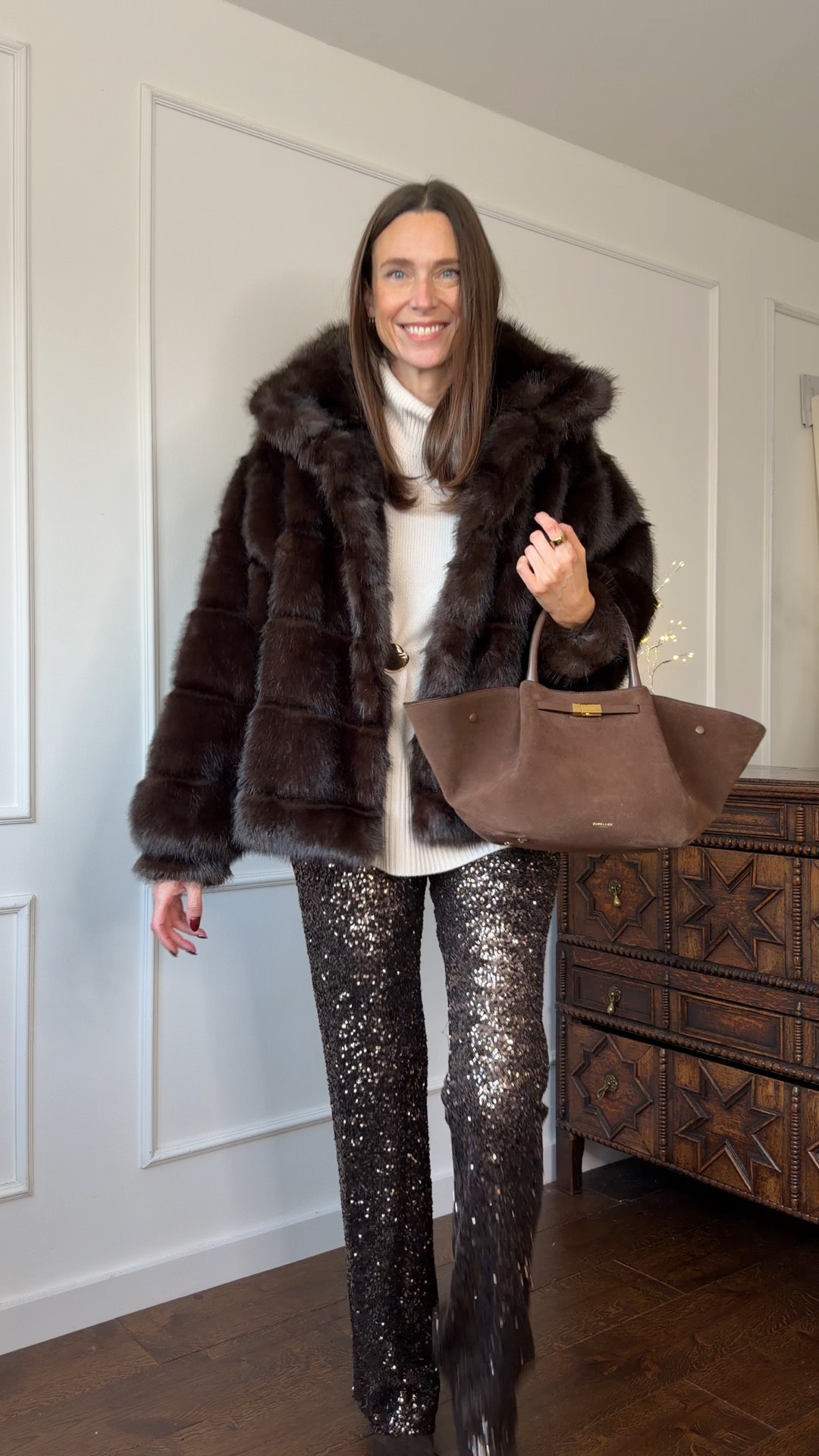 This brown faux fur coat is the dream! Styled here with a cream cashmere jumper, brown sequin trousers and brown suede boots  

#LTKOver40 #LTKootd #LTKgrwm