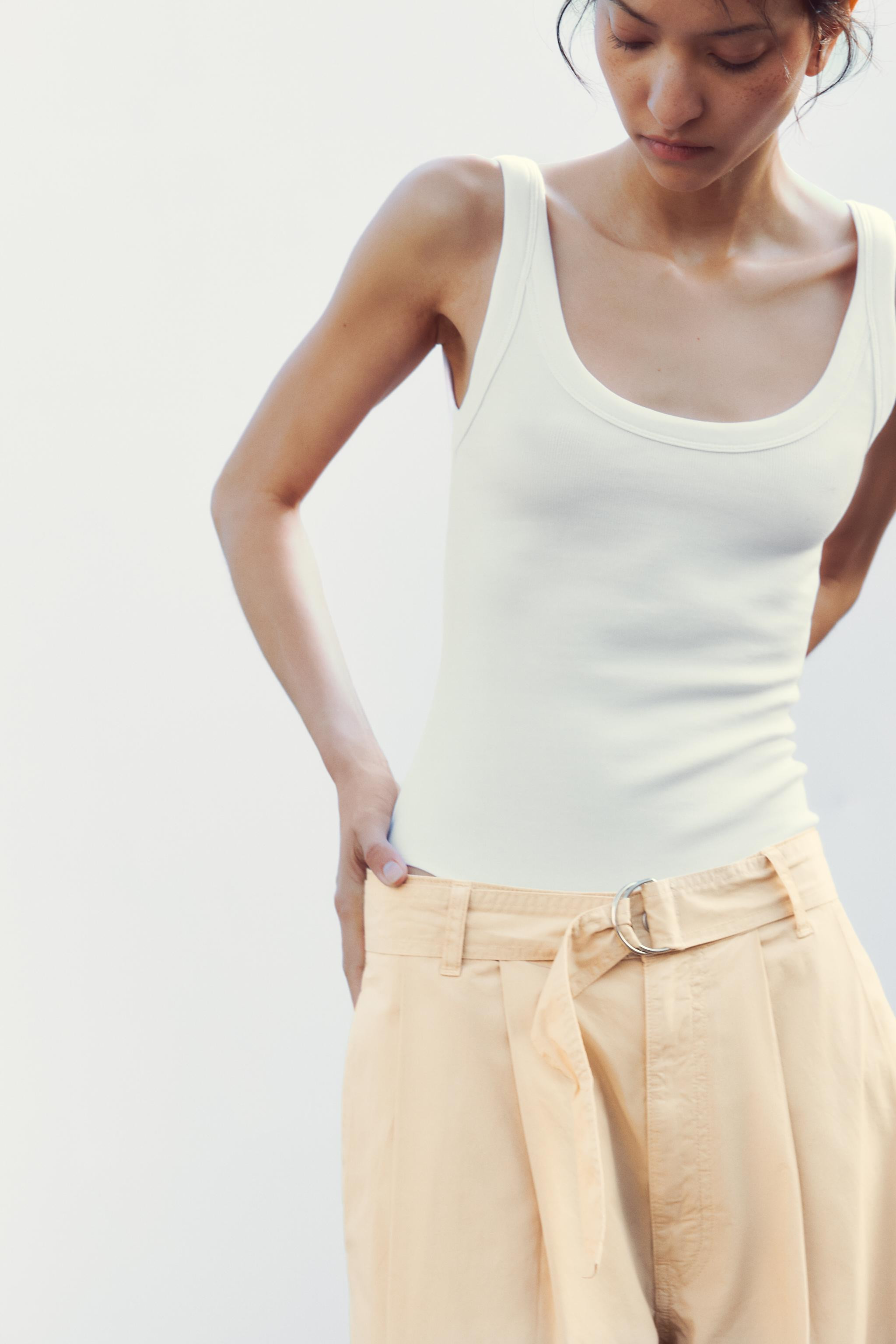 High-waisted pants with belt loops. Side pockets and back patch pockets. Self-fabric belt with me... | Zara US