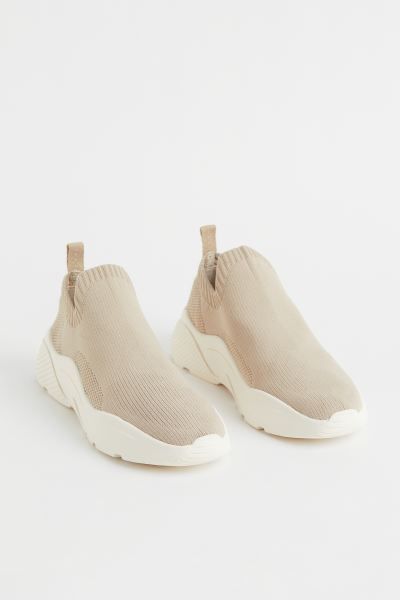 Fine-knit slip-on shoes with an elasticized upper edge and grosgrain loop at back. Mesh insoles a... | H&M (US + CA)