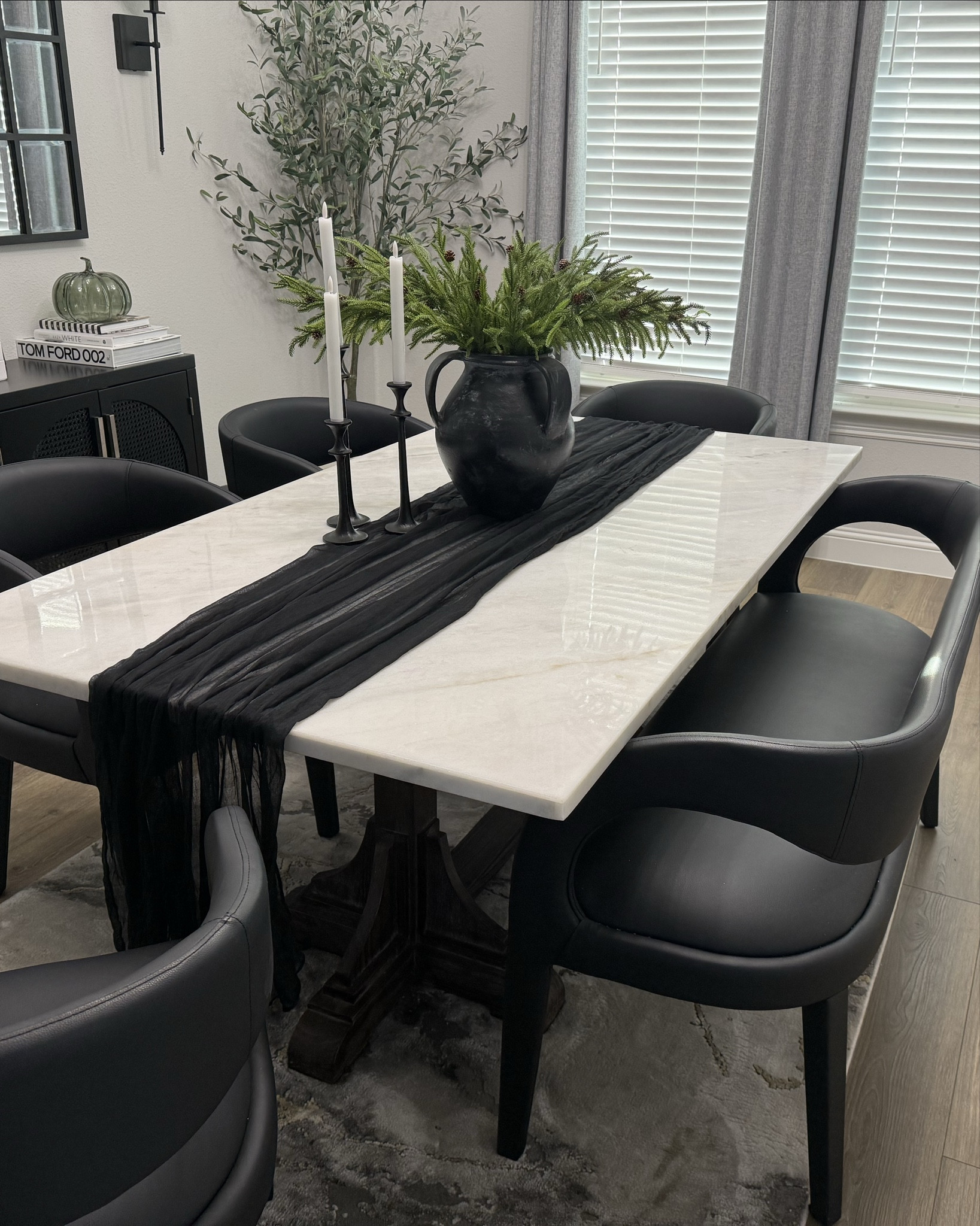 Black and white modern contemporary dining room decor. Marble dining table, dining bench, pottery barn vase, table decor🖤

#LTKU #LTKStyleTip #LTKHome