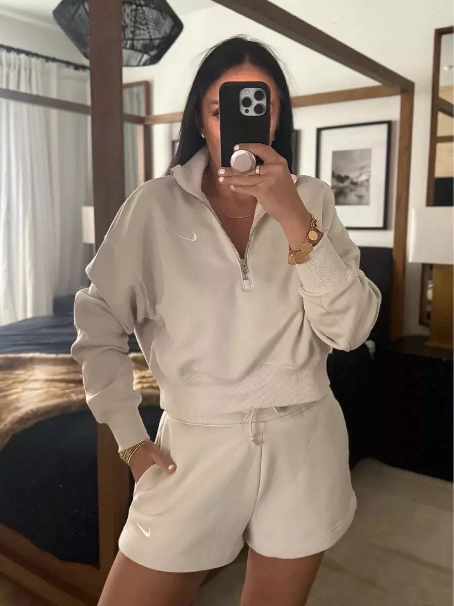 Nike Sportswear Phoenix Fleece pullover is wearing medium size. Nike Sportswear Phoenix Fleece shorts wearing size small.

