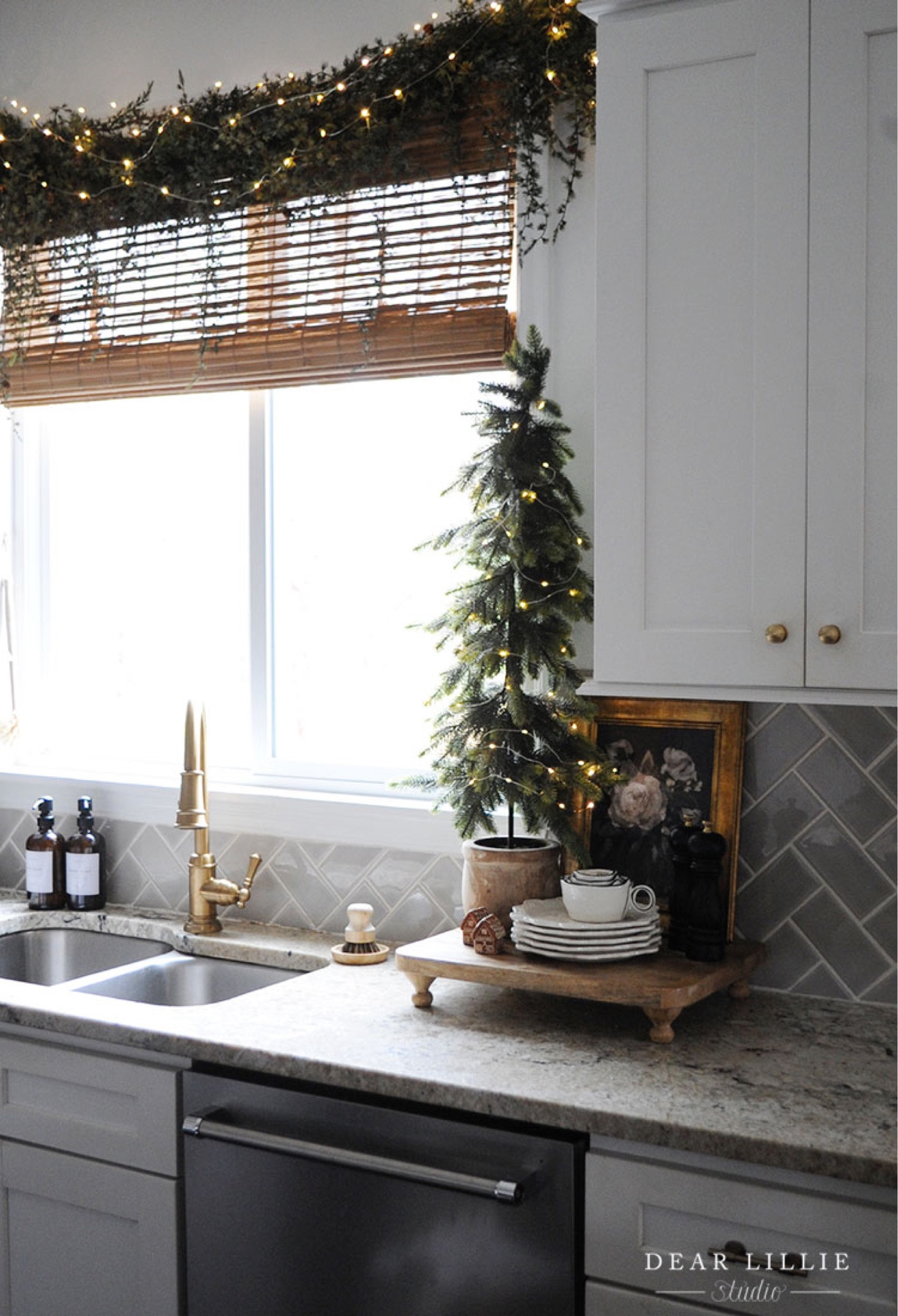 Little Christmas vignette in our kitchen with some tiny gingerbread houses from Pottery Barn  

#LTKHoliday #LTKhome #LTKSeasonal