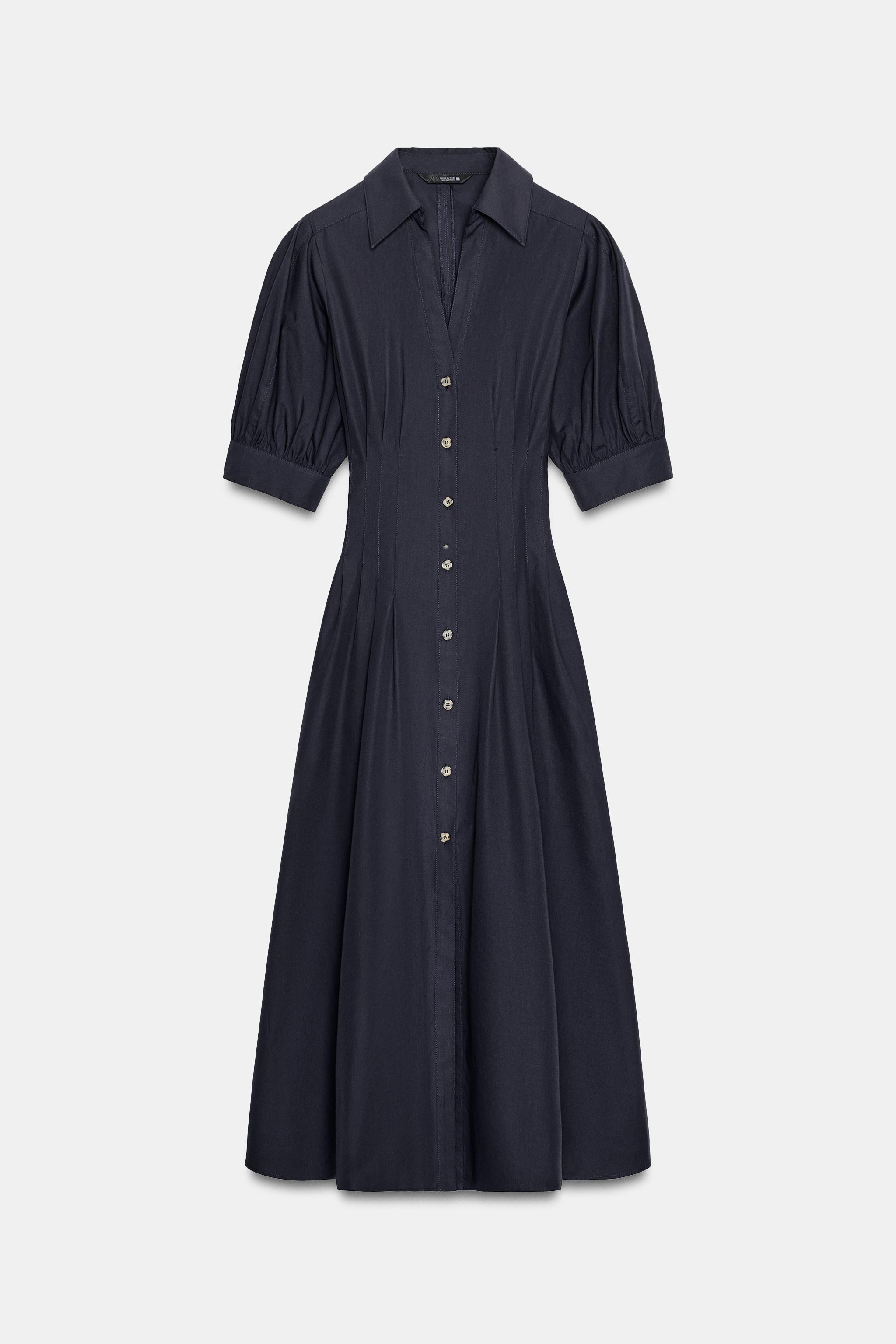 Collared dress featuring a V-neck and short puff sleeves. Fitted waist with darts. In-seam side p... | Zara UK