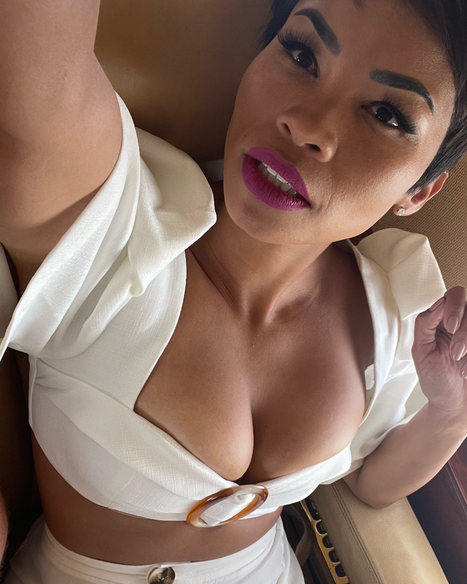 This top is tops! Don’t wear this if you don’t want attention 😉 It delivers all day and night, putting style and other things front and center. My version with the open bottom sleeve is no longer available, but this popular top is still going strong with an almost identical sleeve that is gathered at the bottom