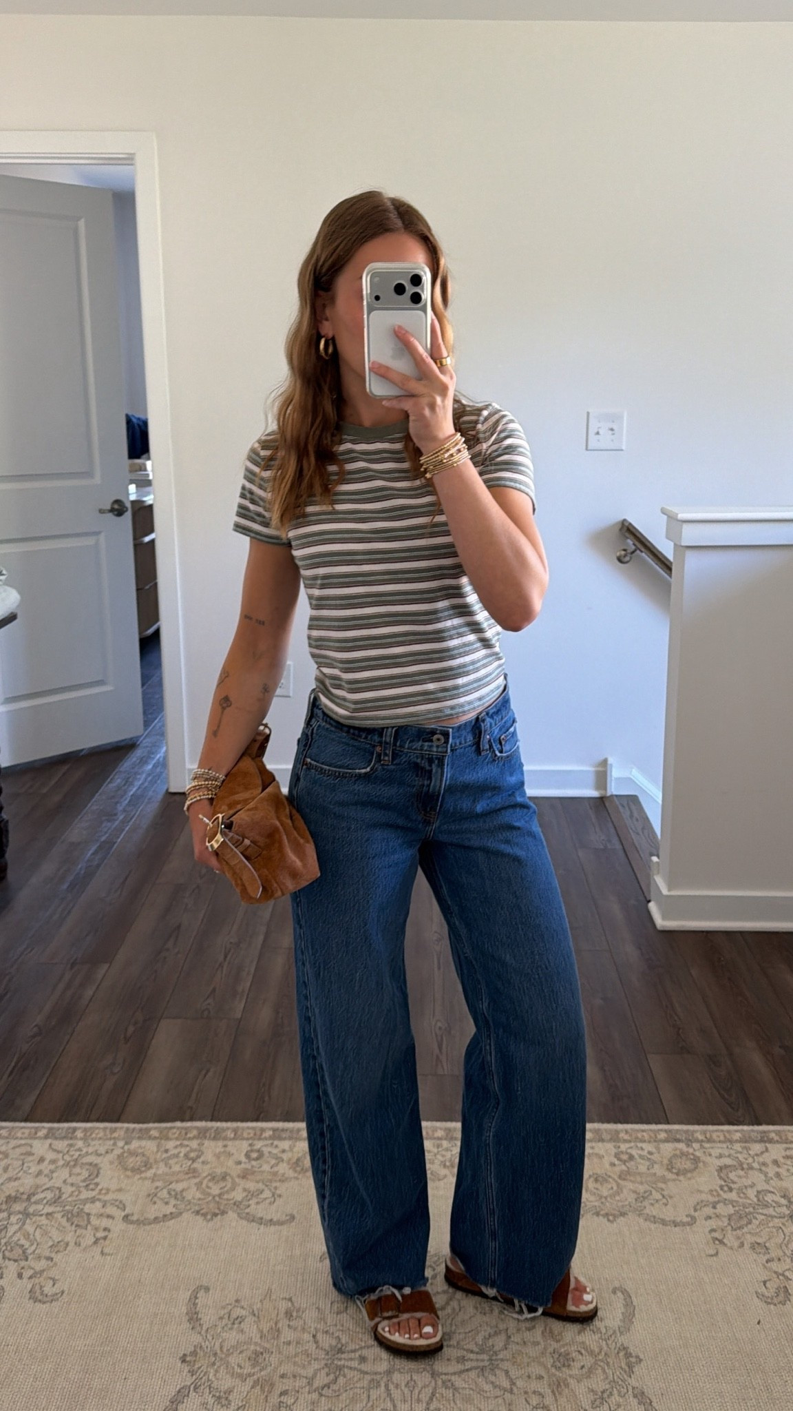 9/7/26 Easy Summer-to-Fall Outfit 🤎

My favorite kind of outfit for these in-between summer + fall days 🤎 Wearing my Abercrombie striped baby tee in an XS with their low-rise loose jeans in a 25 Regular, shearling-lined Birkenstock Arizona sandals, my J.Crew suede bag + Jenny Bird hoops.

Abercrombie is having a Labor Day promo right now — use code LONGWEEKEND for an extra 15% off while it’s still active! Linking my full outfit here ✨

#LTKgrwm #LTKootd #LTKSeasonal
