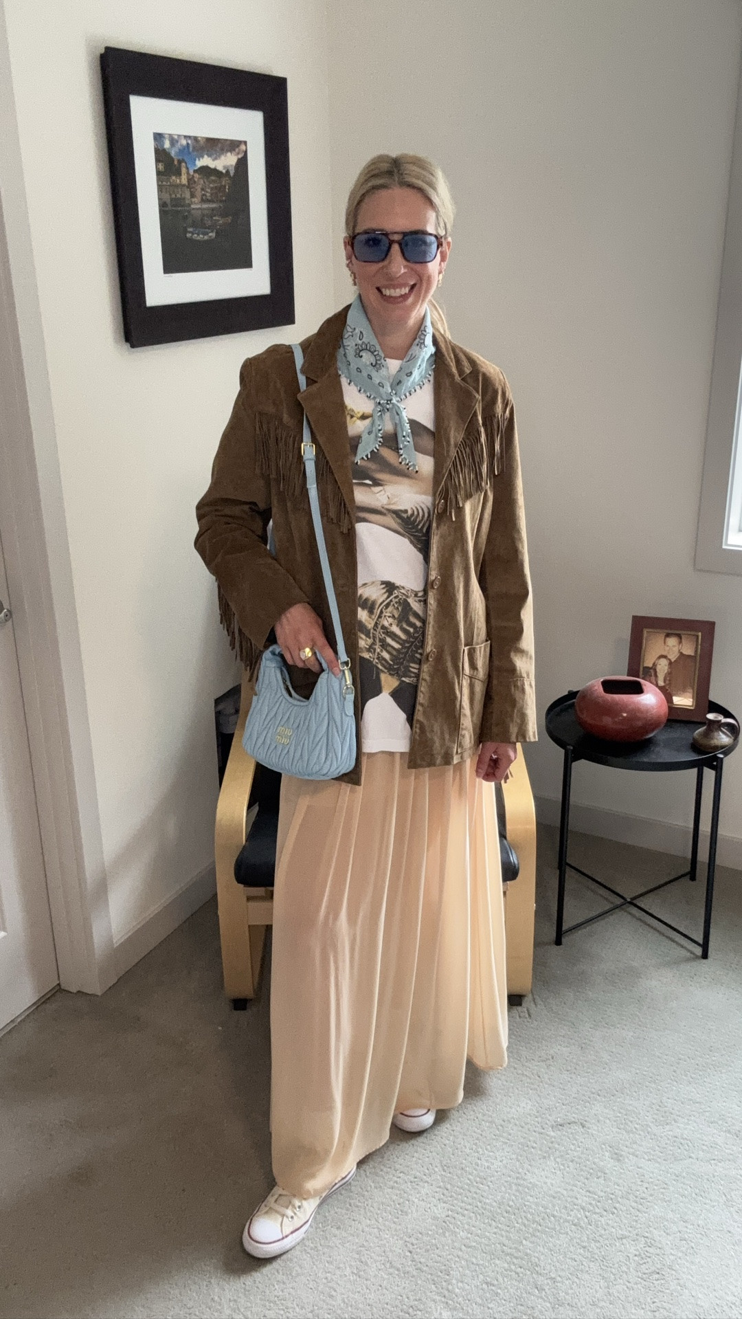 Just a little reminder to have fun with your outfits!! Choose pieces that spark joy, this Madonna Concert tee is full of great memories of seeing her live and always makes me smile 😊 

Madonna Concert Tee
@Zara skirt from @ebay
Shoes @converse
Vintage Suede Fringe Jacket @ebay
Beaded bandana @Madewell 
@miumiu bag from @ebay
Sunnies and ear cuff @amazon 
Vintage @givenchy earrings @ebay

#LTKootd #LTKmomlife #LTKOver40