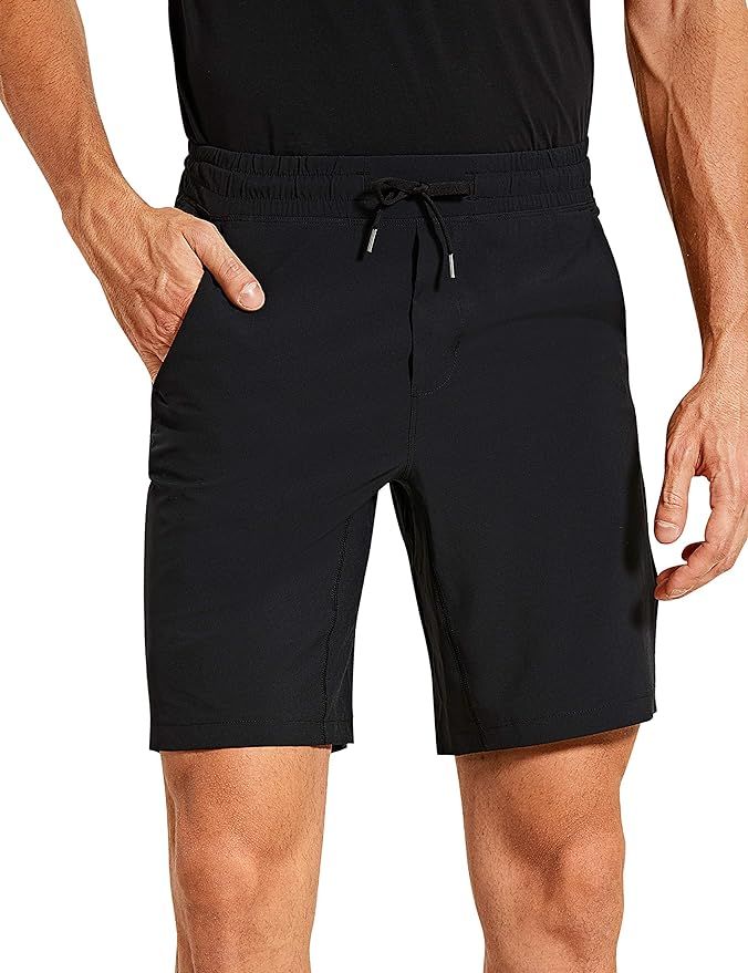 CRZ YOGA Men's Quick-Dry Workout Running Athletic Sports Shorts with Pockets - 9 Inches | Amazon (US)