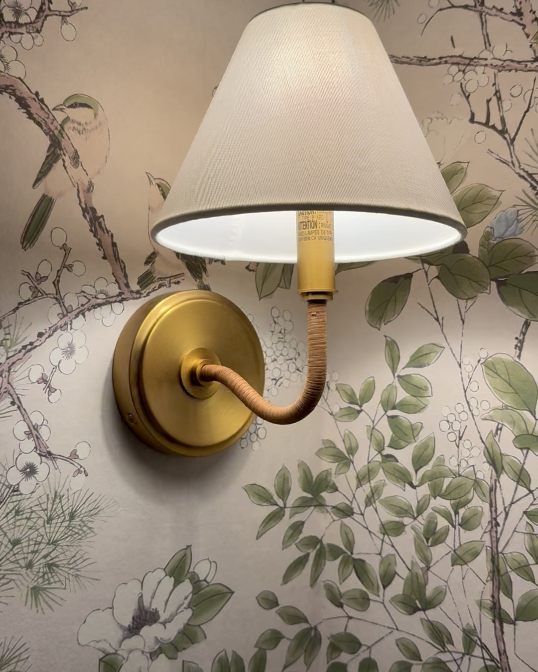 These bathroom sconces tie the whole room together with the rattan details! 

#LTKHome