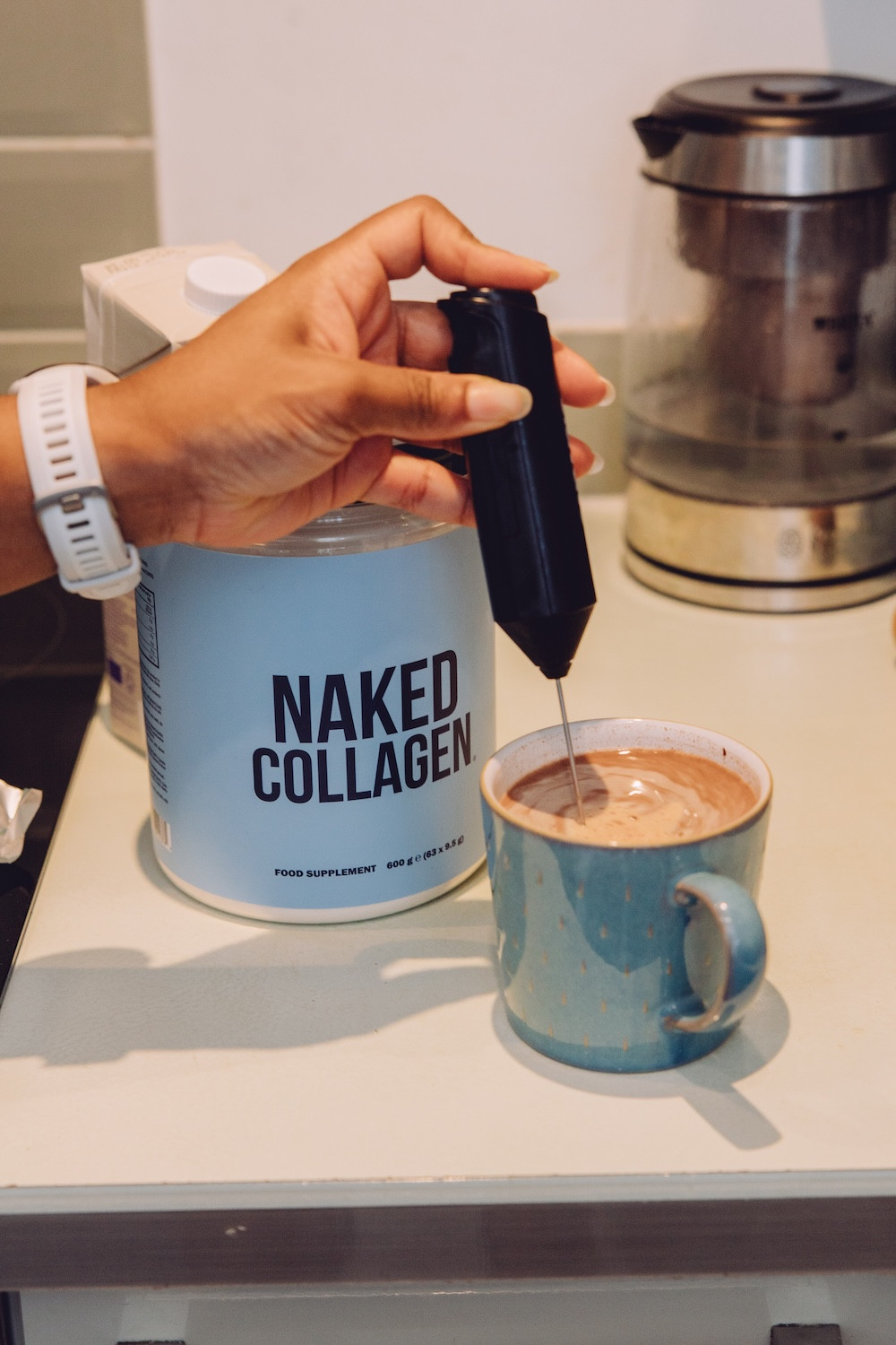 Simple collagen hot chocolate recipe 

25g 70% dark chocolate (I use the individually wrapped Aldi bars, although the mint version is brilliant too.)
200-250ml oat milk
1 serving of collagen powder 

Heat the oat milk in the microwave for around 2 minutes 20 seconds until hot.

While it's heating, crush the chocolate using a rolling pin. Because the pieces are so small, they melt almost instantly.

Pour the crushed chocolate into the hot milk.

Add one scoop of collagen protein powder.

Whisk everything together for around 10 seconds until smooth.

Finish with a dash of cinnamon if you're using it.

#LTKuk #LTKhome #LTKfitness