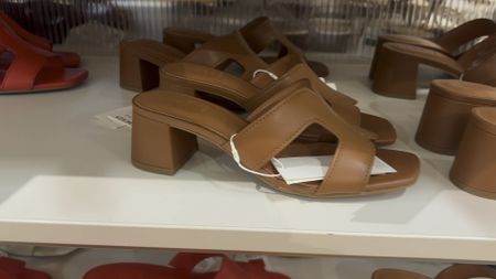 A tan summer sandal, wide fit was small block heel. These come in tan, red, white and black.