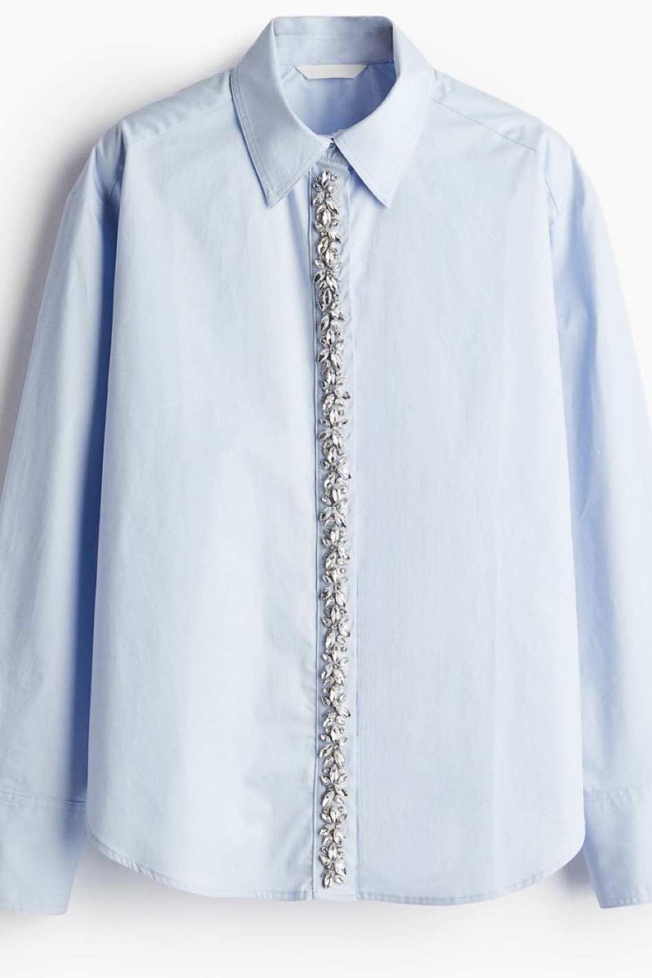 Sky blue shirt with rhinestones in the center 


#LTKFindsUnder50 #LTKWorkwear #LTKSaleAlert