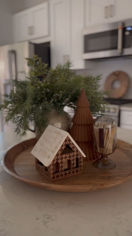 Easy Christmas kitchen centerpiece 🌲🕯️✨ 

I refreshed my kitchen island’s tray today and love how it turned out. Some simple touches and the kitchen is feeling cozy and festive. You can shop this post at the link in my bio. 🫶🏽

#LTKHoliday #LTKSeasonal #LTKhome