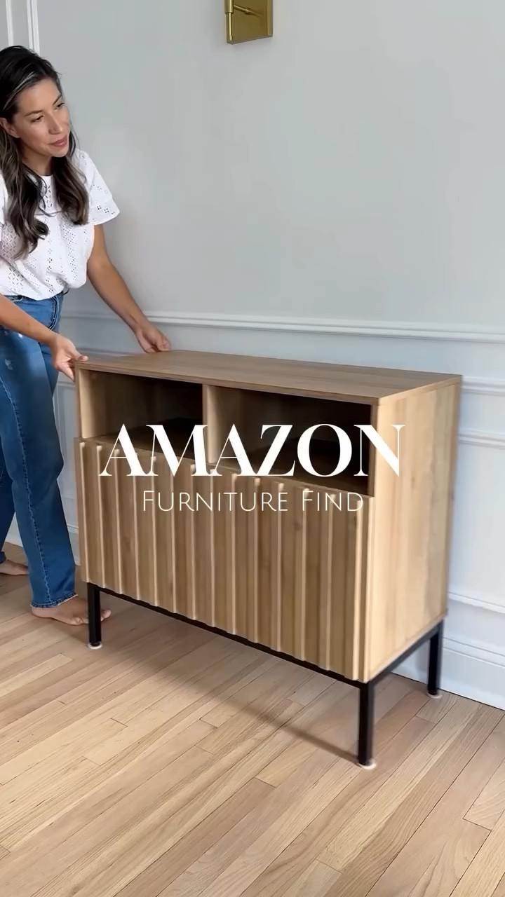 AMAZON CONSOLE TABLE!!

You can style it in
so many ways including as a TV stand, console, buffet table and more! It has the perfect wood tone and the most gorgeous fluted details!!

#LTKHome #LTKStyleTip