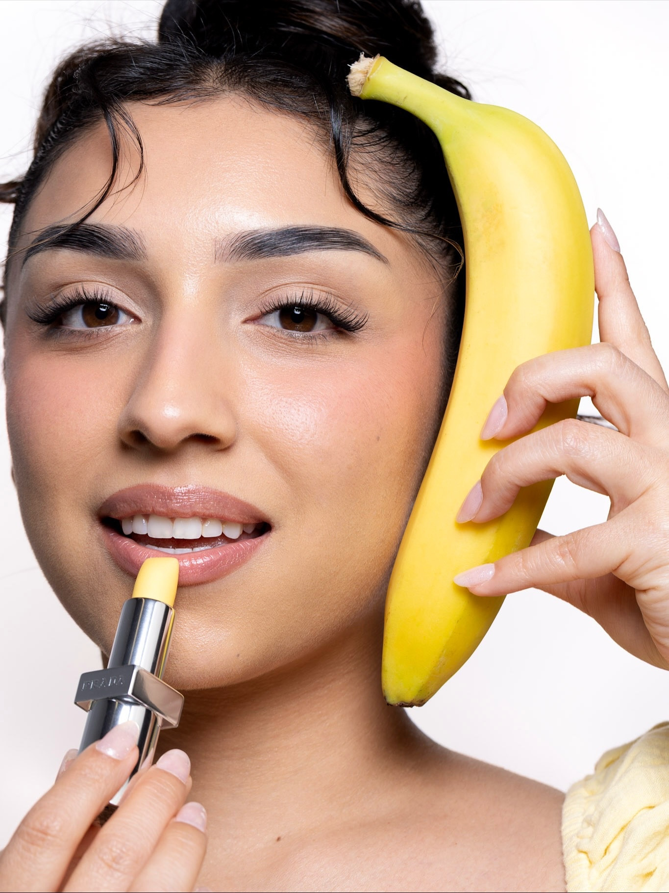 Going bananas for the @pradabeauty lip balm in Banana Yellow 🍌💛 And yes, it smells like banana in a super subtle, light, elevated way✨ 

📸shot by @_absolutelyabs !! 

#pradalipbalm #pradabanana