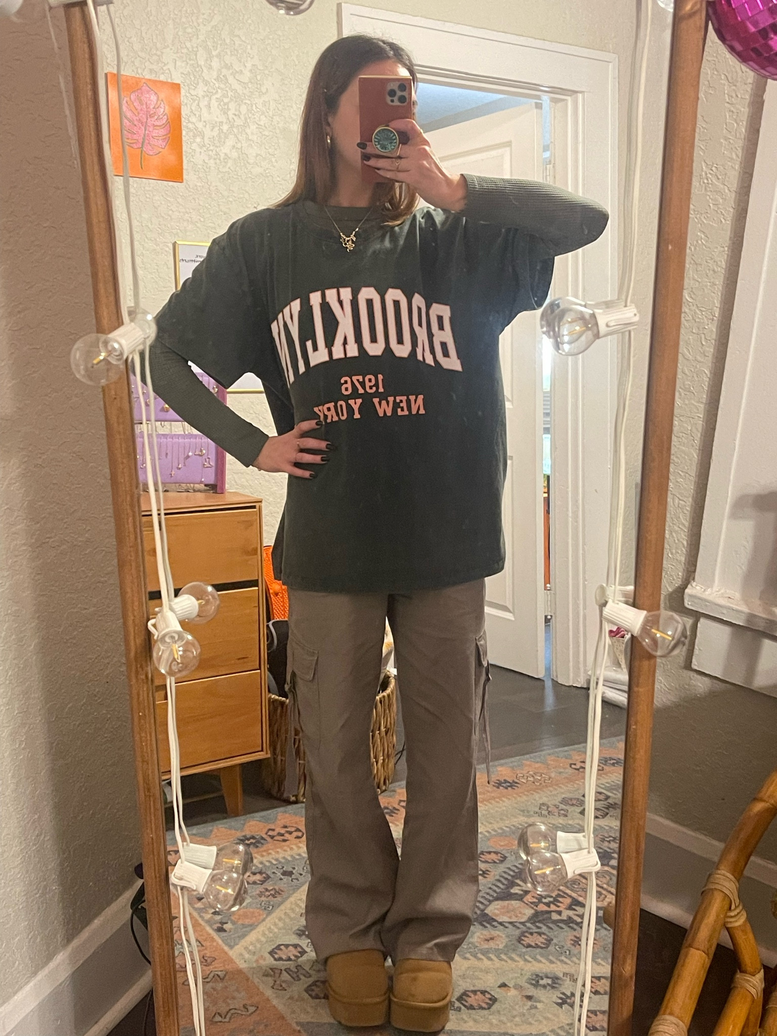 Throwback to this winter outfit I wore like 30 times 😂 Oversized Brooklyn t shirt with army green spandex long sleeve underneath. Taupe/grey cargo pants and platform uggs complete the look! 

#LTKSeasonal #LTKFindsUnder50 #LTKFindsUnder100