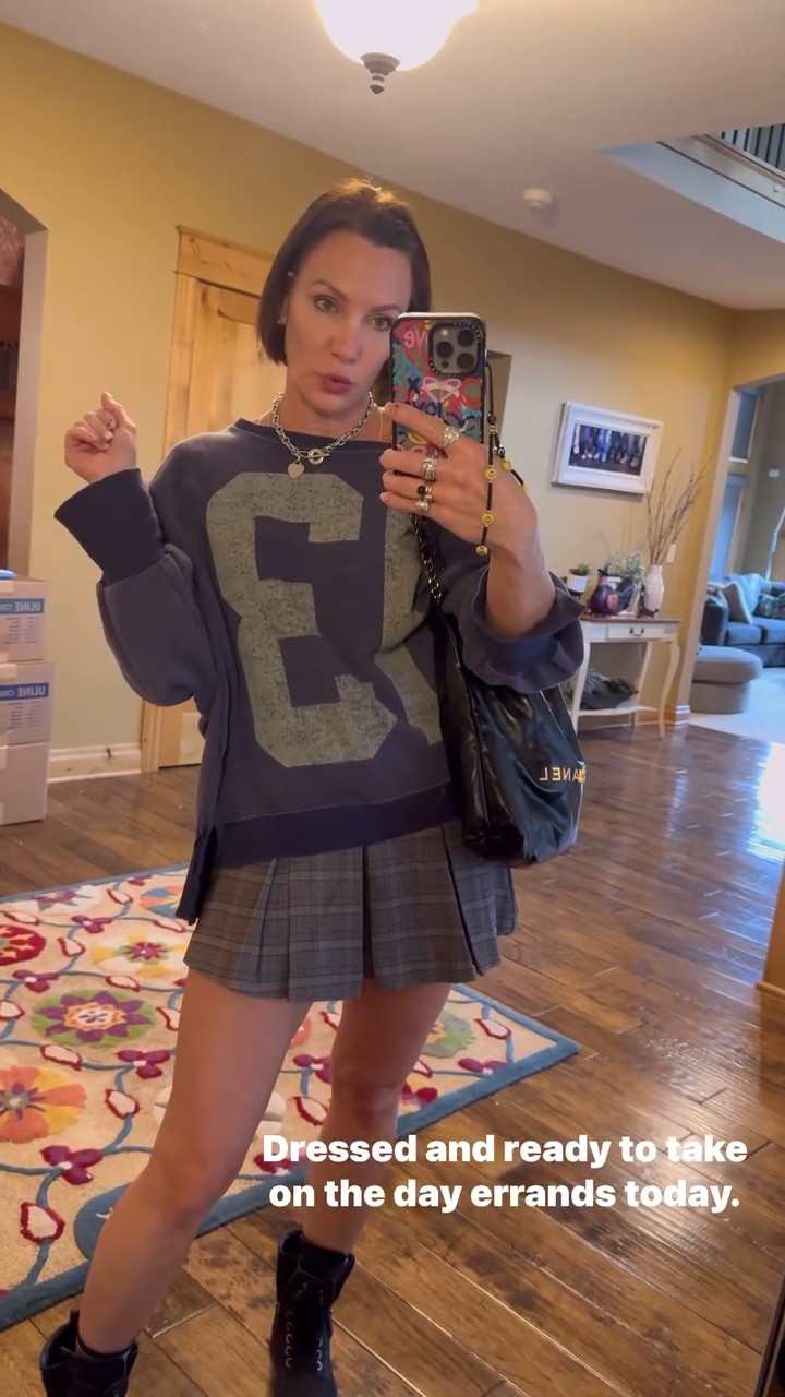 Love layering an oversized sweatshirt with a skirt and boots. Such an easy and cute fall outfit! Shirt is free people- size xs. Skirt is target- size small. Chanel bag.

#LTKVideo #LTKSeasonal #LTKStyleTip