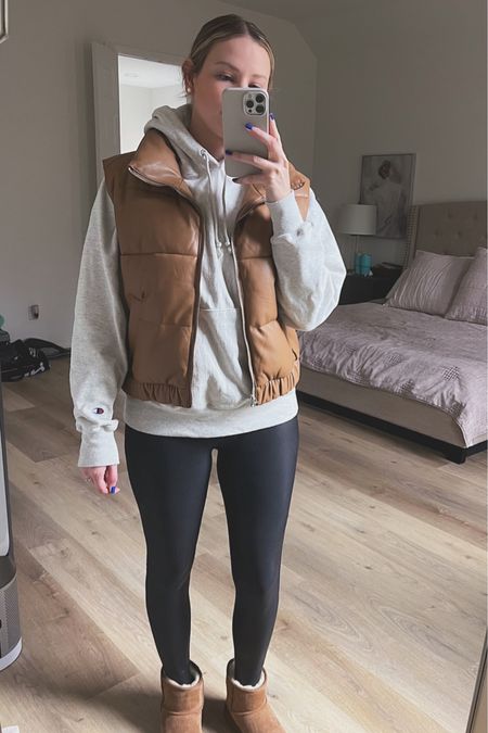 Casual outfit idea, everyday outfit idea, easy outfit idea, cute outfit, vest, mini puffer vest, faux leather, champion hoodie, sweatshirt, faux leather leggings, spanx, ugg, Ugg mini booties, Fashionablyjilliebean 

#LTKGiftGuide #LTKHoliday #LTKSeasonal