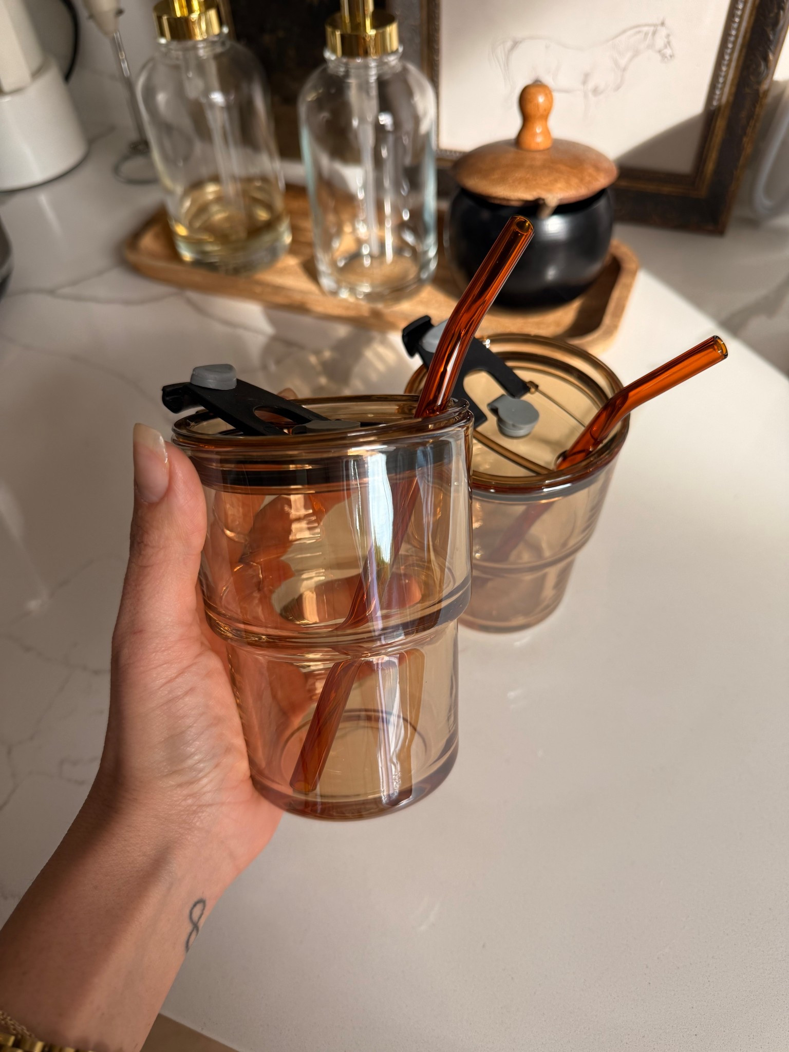 Amazon glass coffee to go cups! Love the amber color. Great gift idea as well

Amazon finds 
Coffee station 


#LTKmorningroutine #LTKHome #LTKSeasonal