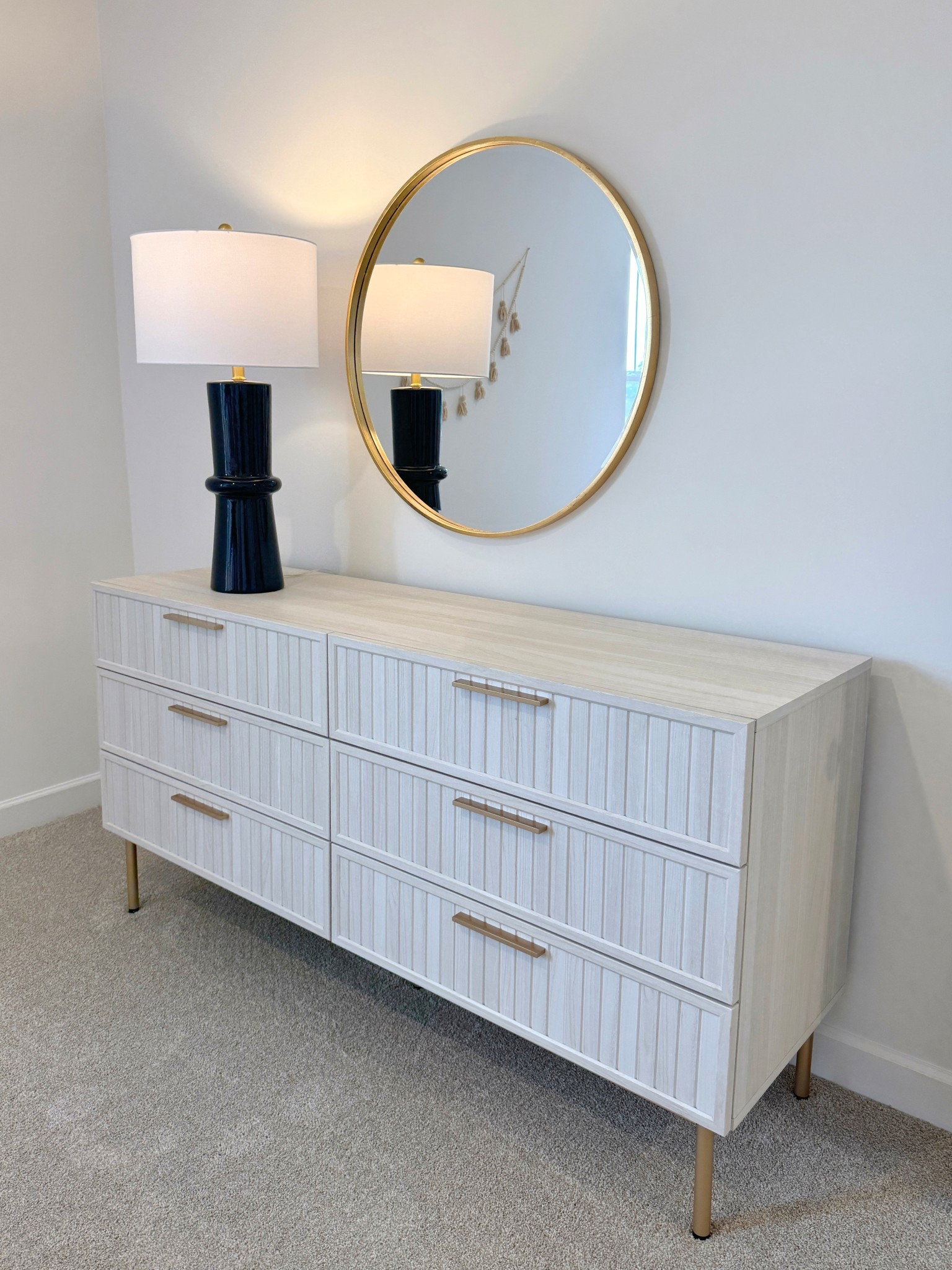 Sale alert! 🤍 The Starns 6-Drawer Dresser from Wayfair is such a chic bedroom find. ✨ I love the fluted drawer fronts, slim gold metal legs, and modern bar pulls—the whole piece feels clean, contemporary, and elevated! 💫 Shown here in the bleached white with gold accents, but it also comes in four other beautiful finishes. With six roomy drawers, it’s a stylish way to keep clothing and linens organized while adding texture to your bedroom. Linked this dresser and similar styles to shop! 🙌🏻 #WayfairFinds #BedroomFurniture #Dresser

#LTKSaleAlert #LTKHome