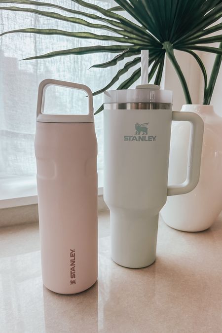 @stanley_brand water bottles / tumblers I brought on vacation 🌴
I love the new ICEFLOW bottle with cap for walks / it’s so lightweight and easy to carry. And my 40oz is a must have for ice cold water all day on the beach 🤍

Ice flow pictured in rose quartz glimmer
40 oz pictured in mist

#stanleypartner 

#LTKSeasonal #LTKFindsUnder50 #LTKFindsUnder100