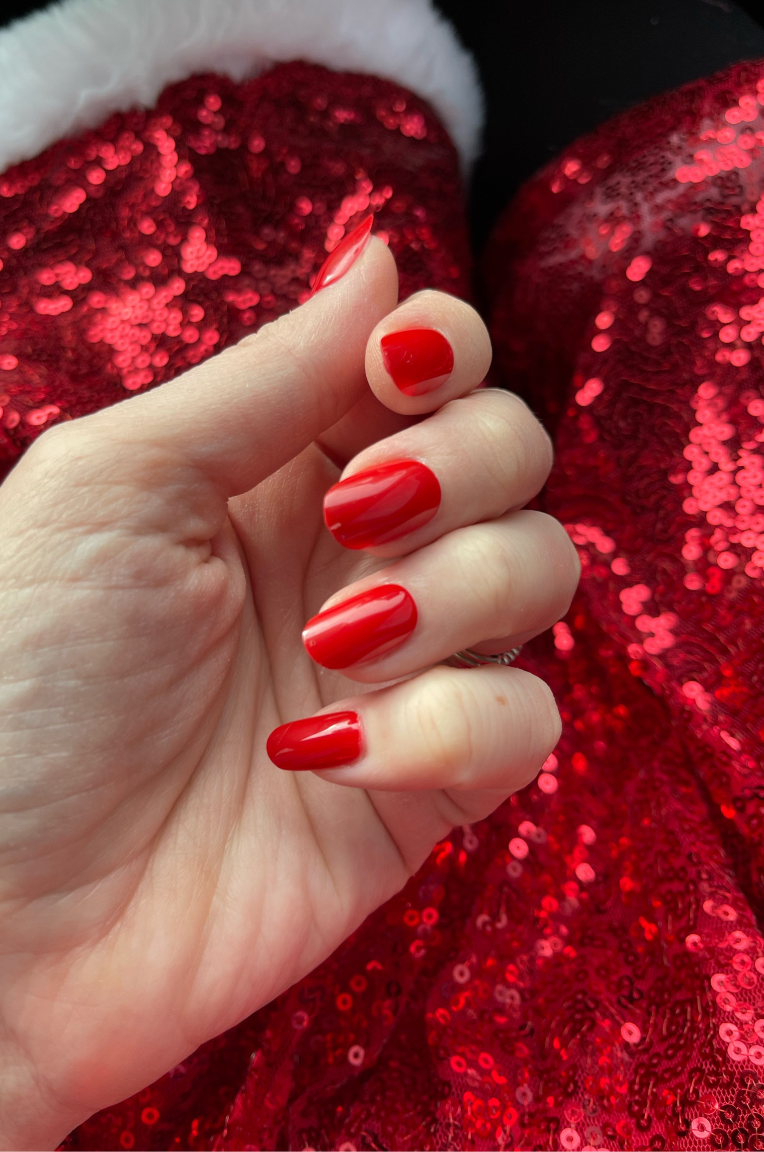 Olive & June Lollipop red press on nails. They are “short” but more like a medium length. If you want it shorter, file it down  

#LTKHoliday #LTKBeauty