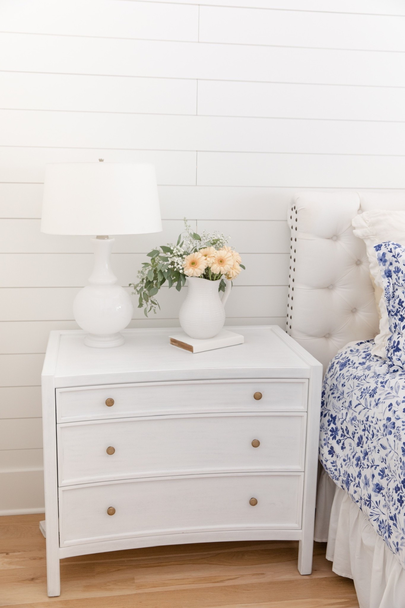 Details of my bedroom nightstand & upholstered headboard! Love these white tones.

#LTKSeasonal #LTKHome
