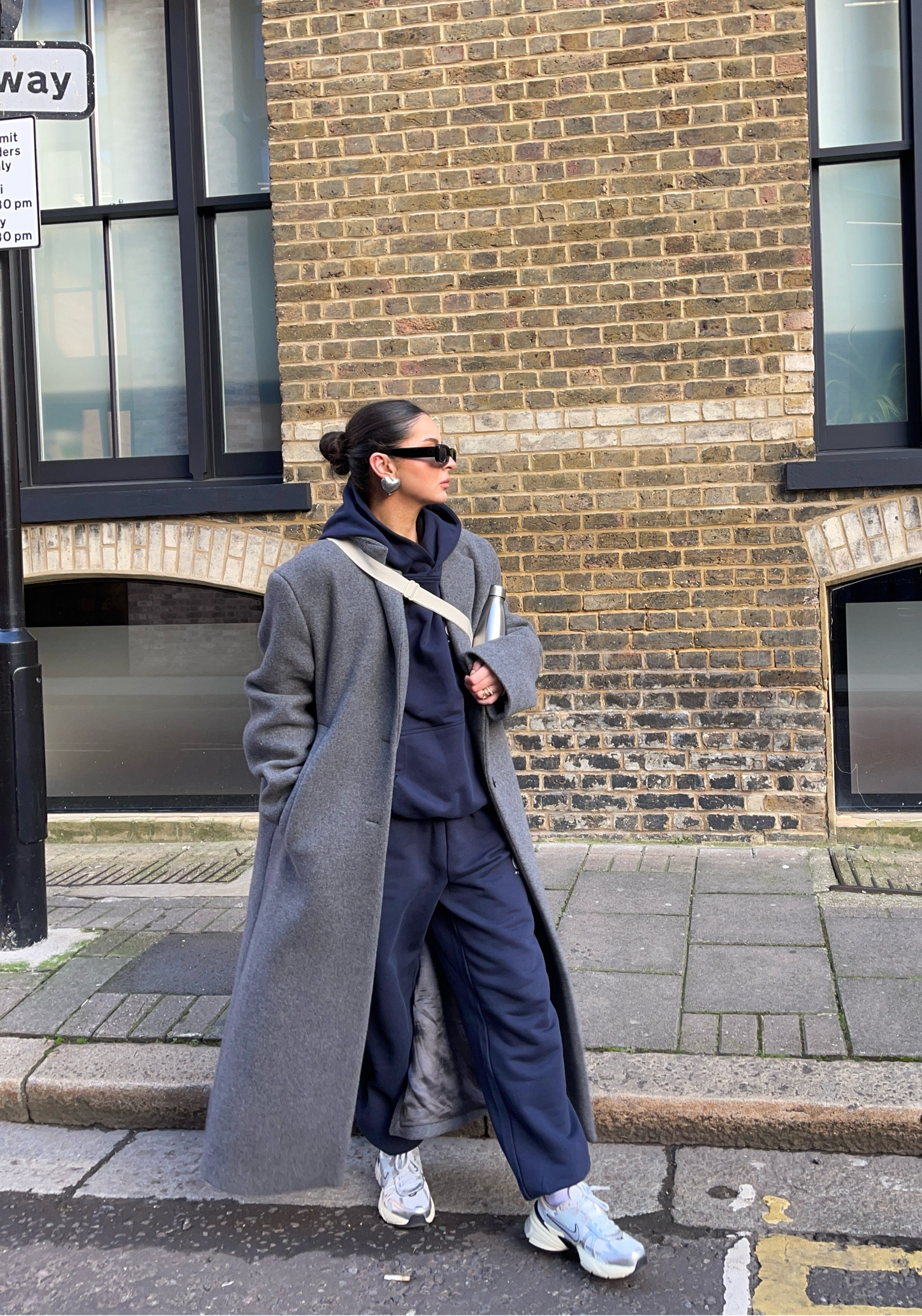 H&m, Adanola, Nike, Uniqlo, Asos, transitional outfit, transitional style, winter outfit, winter fashion, grey coat, wool coat, Adanola performance, oversized hoodie, navy hoodie, navy joggers, navy tracksuit, Nike v2k, crossbody bag, nylon bag, white trainers, athleisure outfit, athleisure style, winter outfit ideas, style inspiration 

#LTKstyletip #LTKSeasonal #LTKeurope