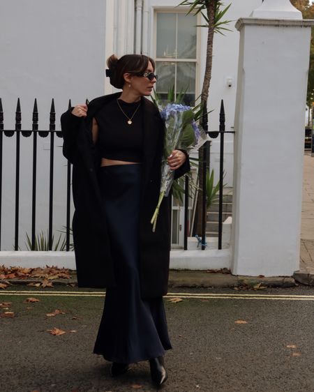 Navy satin skirt, black coat, reformation, autumn outfit, winter outfit, minimal style, minimal outfit, London street style, elegant outfit, workwear, work outfit, ankle boots, maxi skirt, silky skirt

#LTKeurope #LTKstyletip #LTKworkwear