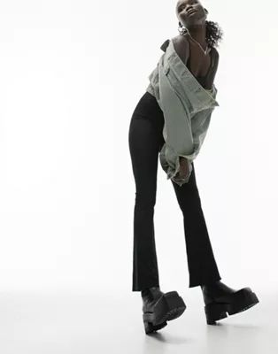 Topshop Petite skinny rib flared pants in black | ASOS (Global)