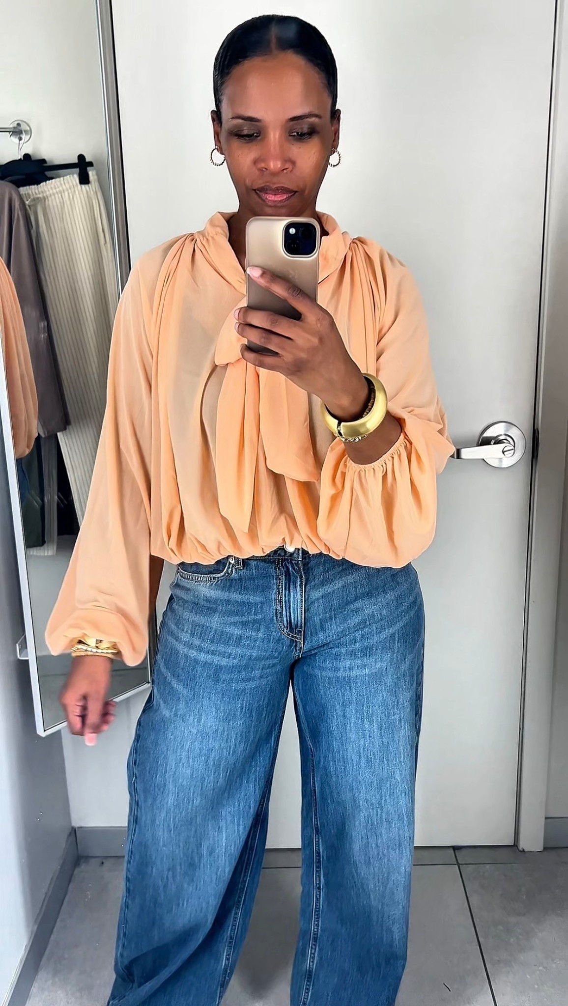 The color on this peach tie neck blouse is stunning and the fit of these high waisted wide leg jeans are perfect.
Spring new arrivals summer fashion trends outfit ideas upscale casual workwear street wear over 40 fashion 

#LTKootd #LTKWorkwear #LTKOver40