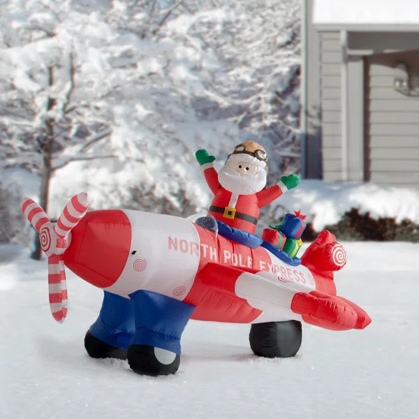 Christmas Animated Santa Claus Driving Airplane Decoration Inflatable | Wayfair North America