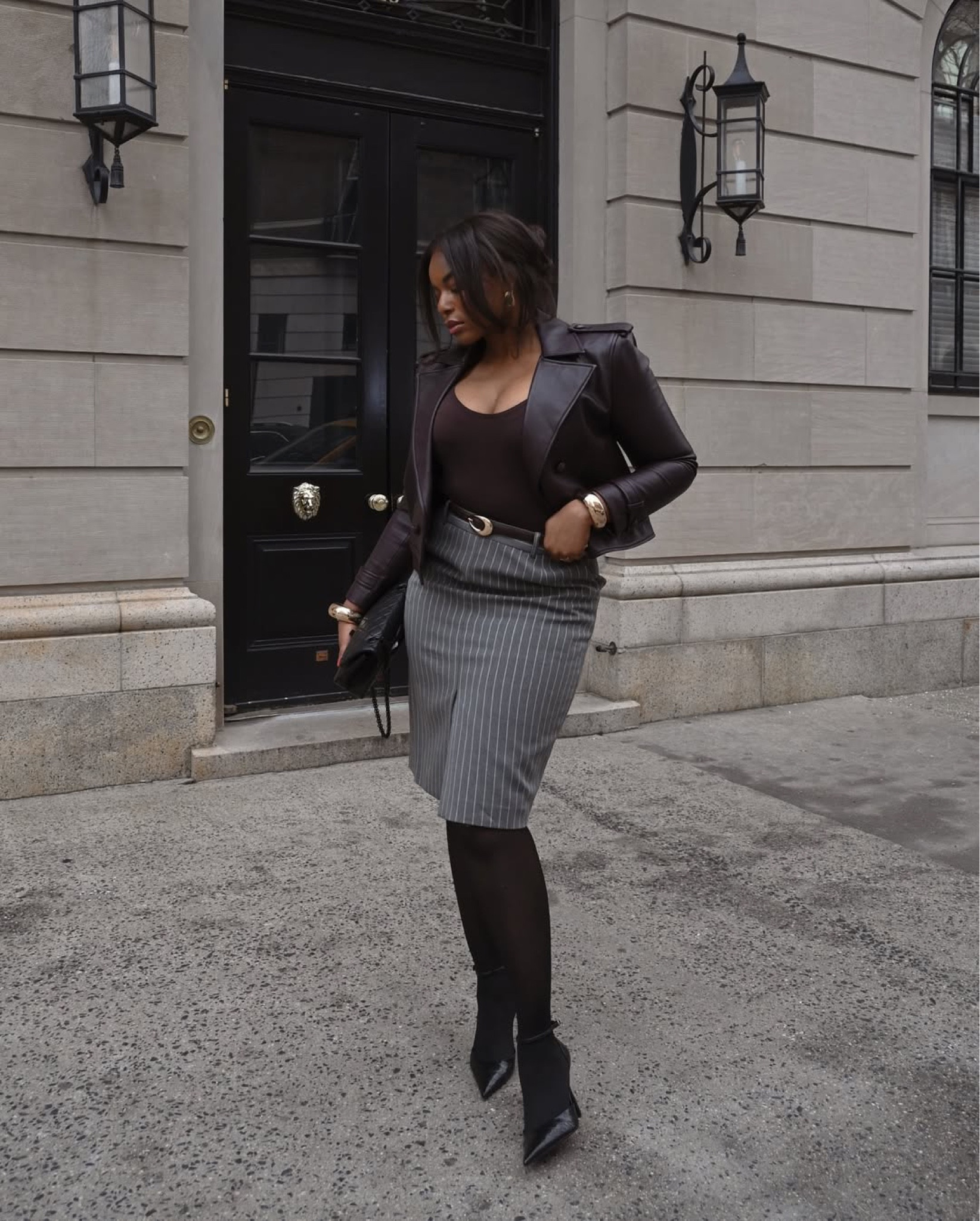 Winter to spring transitional outfit idea. Wearing a cropped leather moto jacket, bodysuit, gray pencil skirt, black tights, black heels, black leather belt from revolve. Perfect outfit for work or for date night! .. For more links to date night outfits, accolade crew neck pullover, romantic knits, pegasus premium running shoe, patterned tights, brooch, lace trim, dark wash denim, valentines day outfit women, follow me on LTK! ✨

#LTKWorkwear #LTKgrwm #LTKNYFW