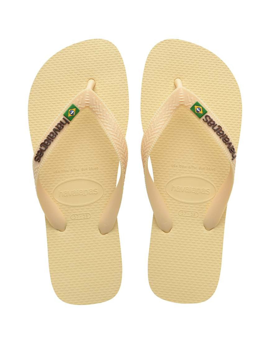 Havaianas Brazil logo flip flops in buttercream-White | ASOS (Global)