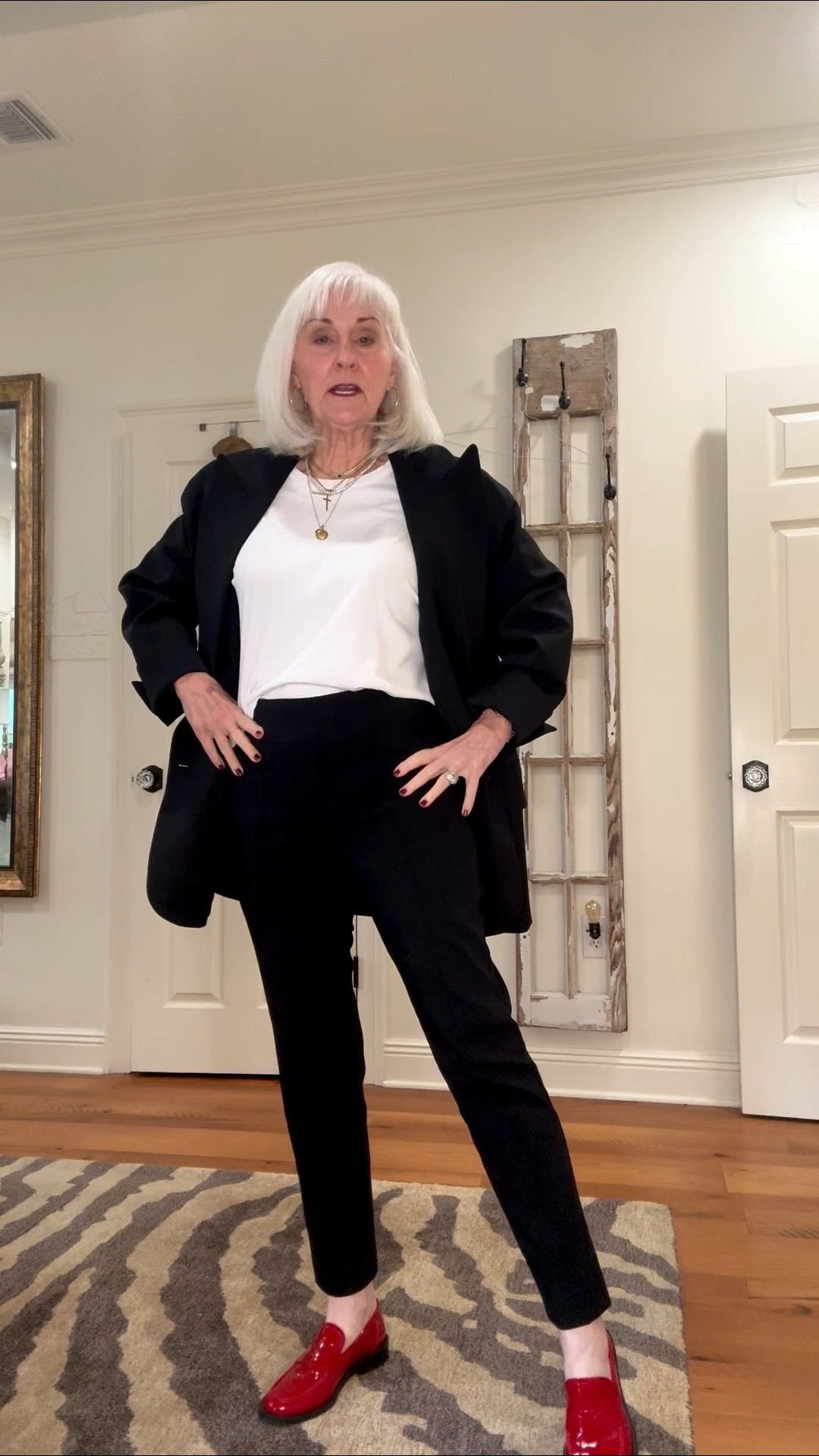 Some slim, cropped pants and an oversized blazer topped off with red shoes!  A nod to the upcoming holidays for Mass  

#LTKOver40 #LTKHoliday #LTKCyberWeek