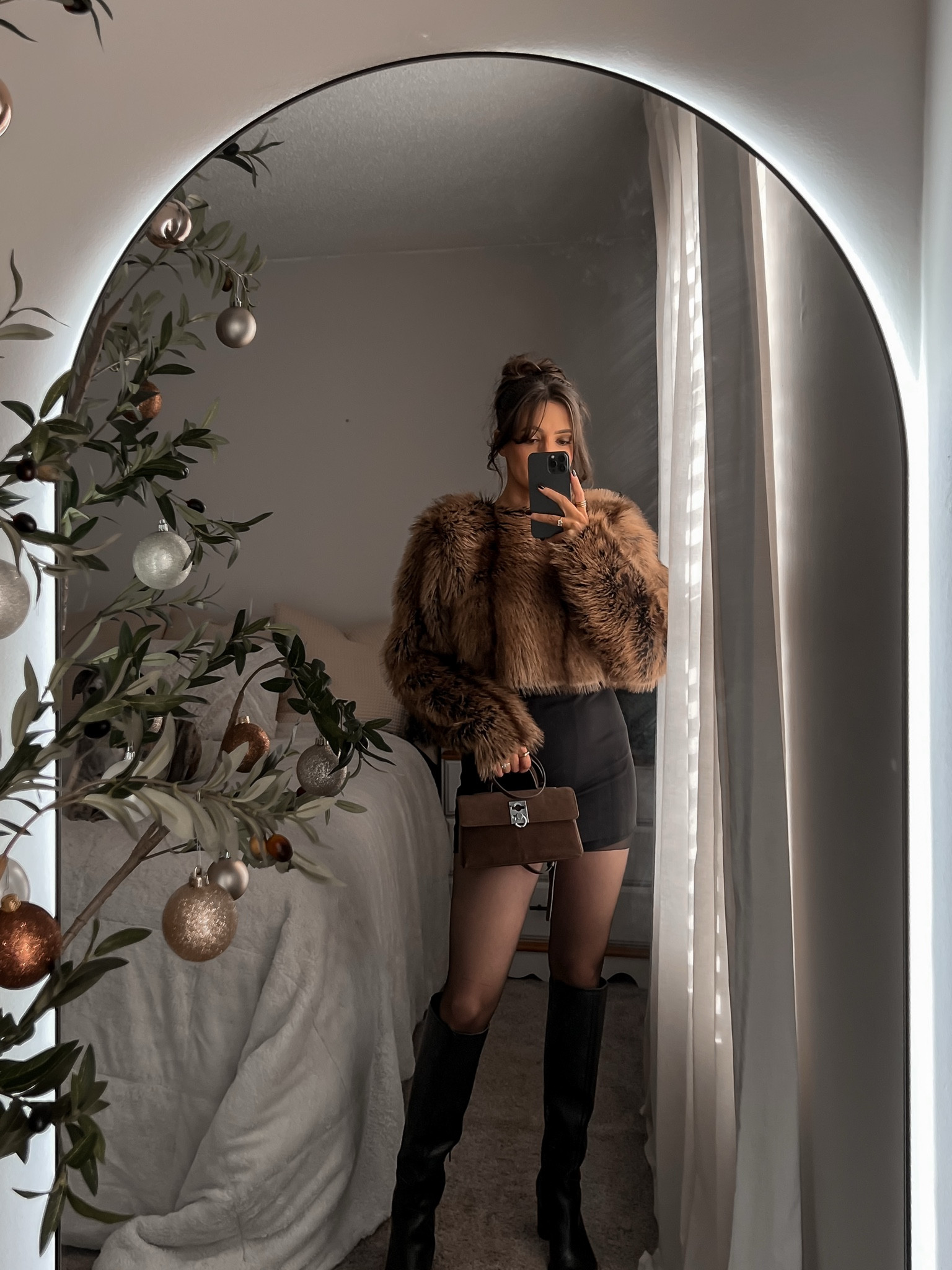 A Holiday party outfit is never complete without a faux fur coat.

I’m wearing the coat backwards btw! Size up with this one. I’m wearing a small and it’s a little restrictive on my shoulders. 



#LTKSeasonal #LTKHoliday #LTKParties