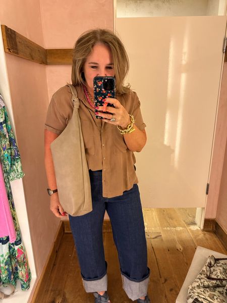 Cool girl right here! 
Blouse is super soft but runs small. I’m in an XL
Jeans have nice stretch. Wearing a 12/31
Having trouble finding this bag online! Linking several great bags. 

Spring summer denim jeans Anthropologie wide leg cuff jeans 

#LTKover40 #LTKitbag #LTKmidsize
