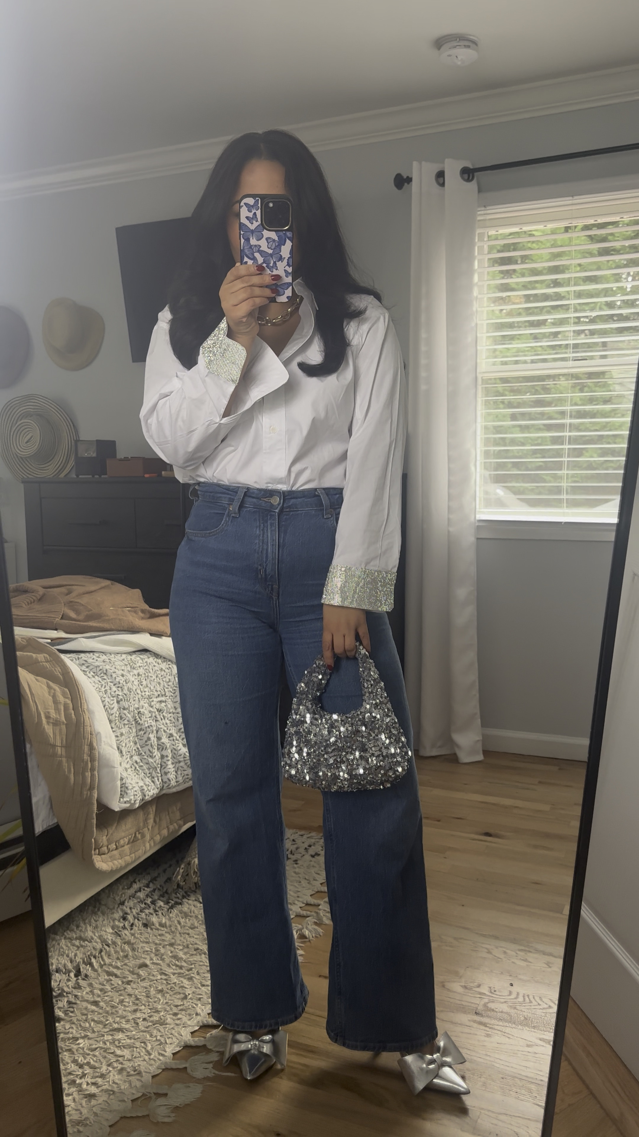 This button down from vici is giving party vibes because of the sequined cuffs! The wide leg Jeans I have been wearing on repeat from hm and the sequin bag from hm that I am obsessed with! 

#LTKHoliday #LTKFindsUnder100 #LTKStyleTip