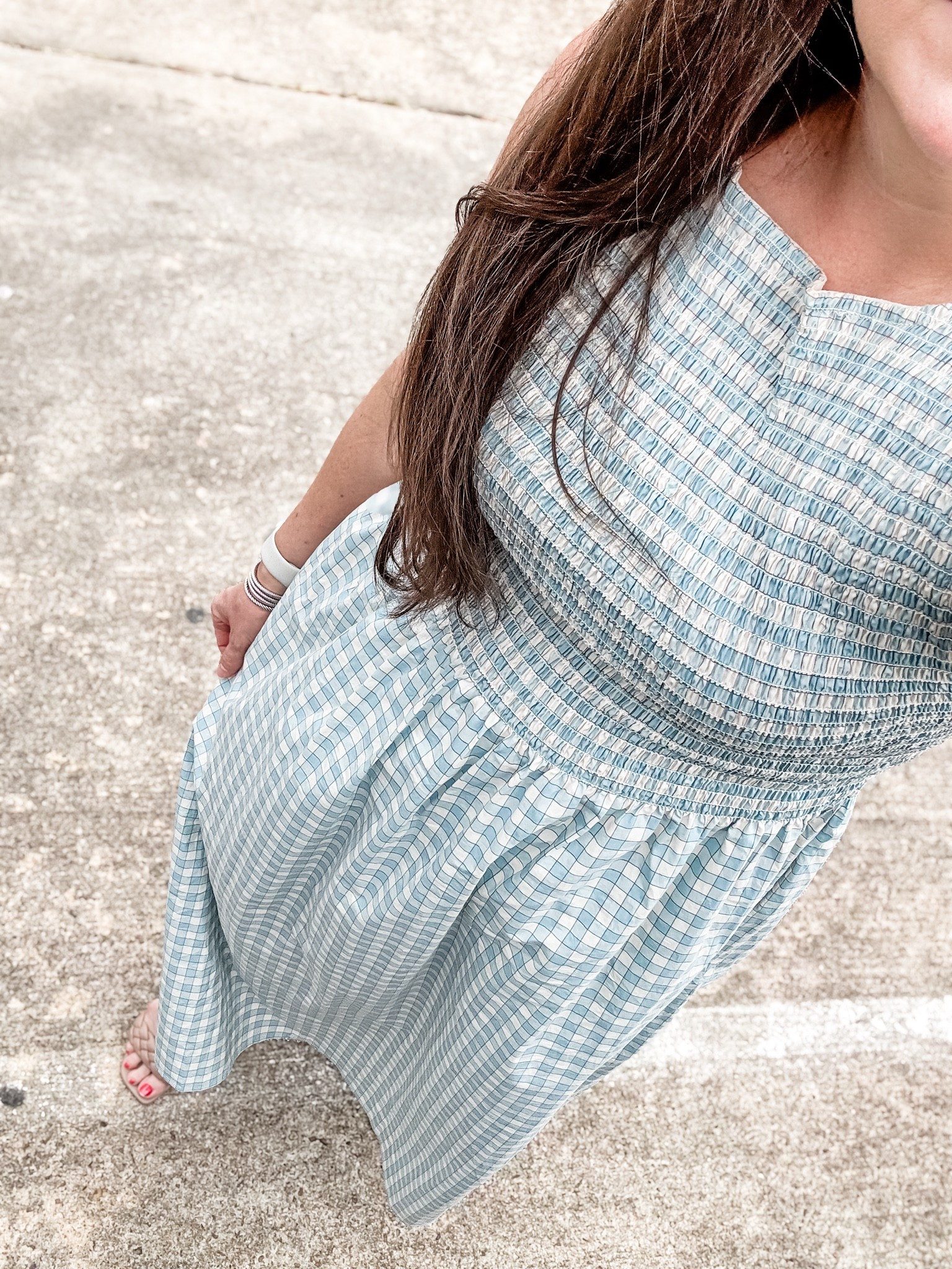 Blue gingham plaid maxi dress of my dreams 💙 This smocked dress is the perfect summer outfit for everything from brunch dates to work outfits, baby showers, vacations, and graduation dresses for spring and summer events. The flattering fit makes it such a cute option for postpartum outfits while still feeling lightweight and comfortable in the heat. Loving the classic blue gingham print and flowy maxi length for an effortless feminine look.

#LTKSeasonal #LTKootd #LTKPetite
