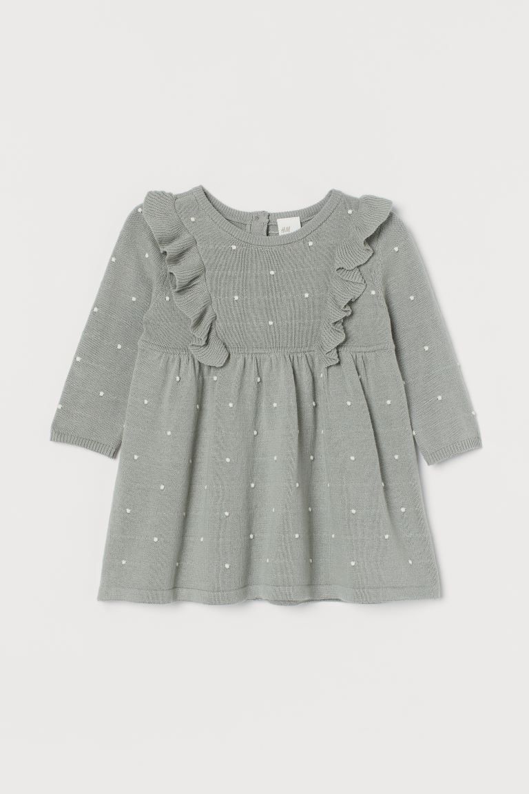 Long-sleeved dress in soft, textured-knit cotton. Ruffles at front, buttons at back of neck, and ... | H&M (US + CA)
