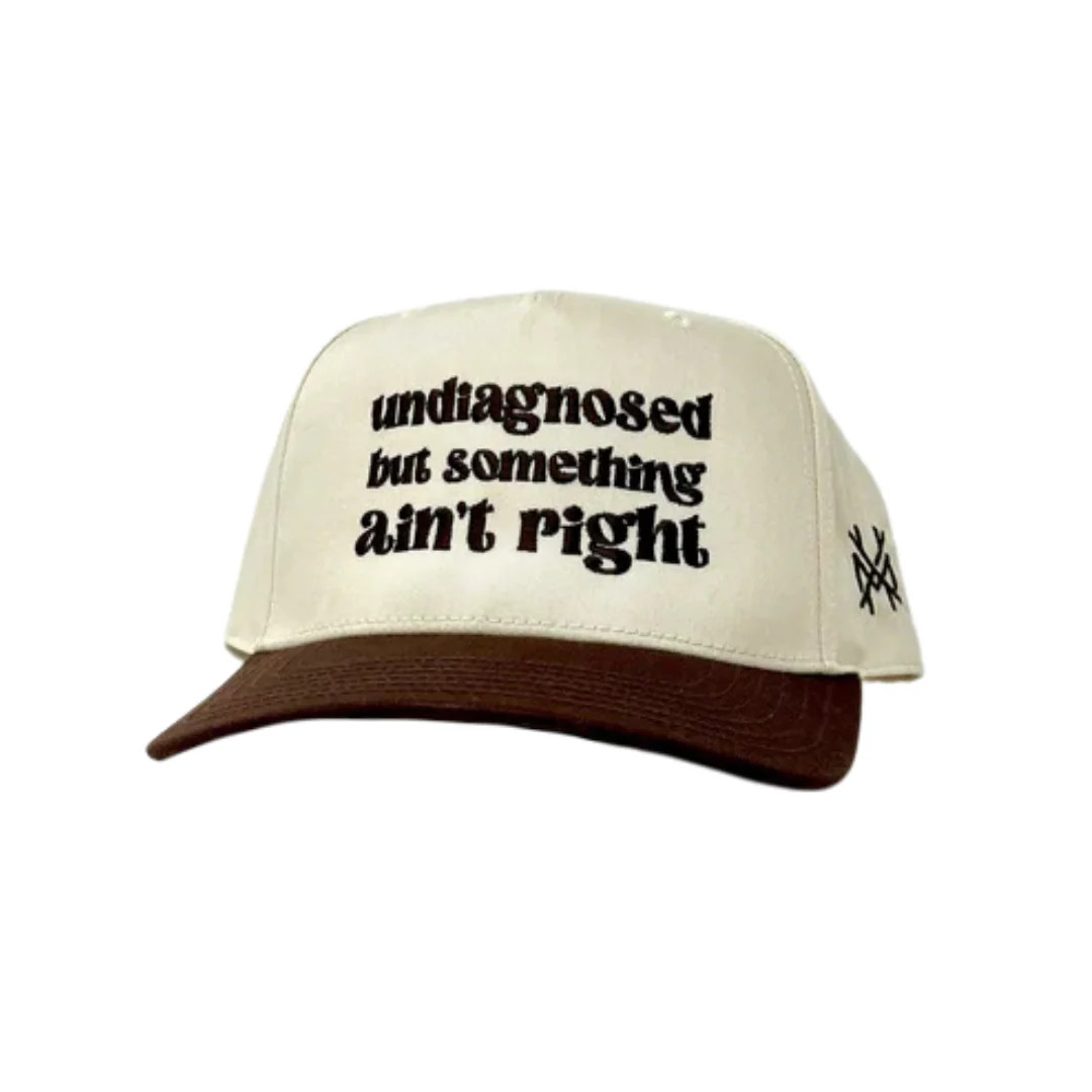 MHC Undiagnosed But Something Ain't Right Trucker Hat | The Mad Hatter Company