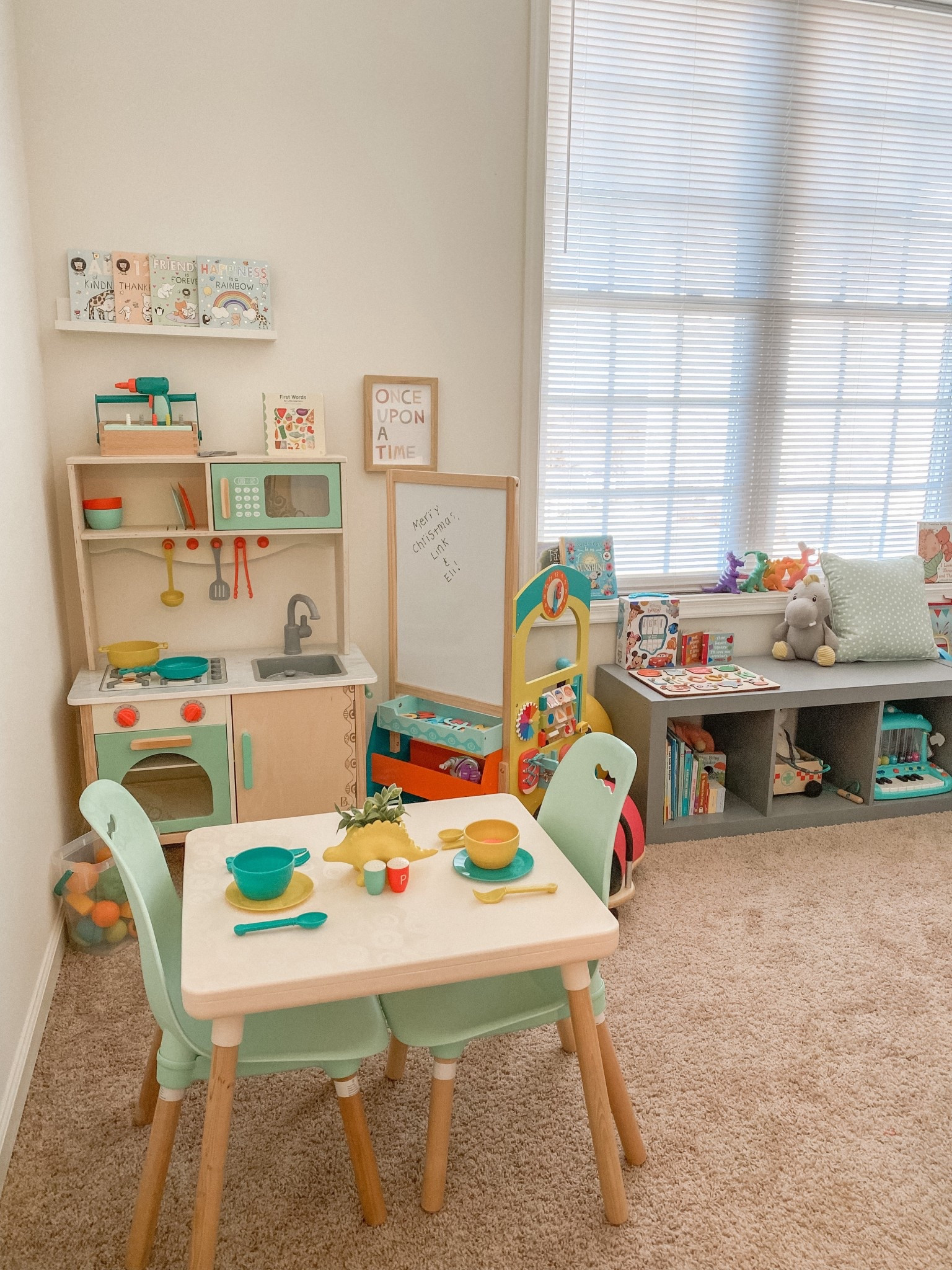 The play room, fully set up with a play kitchen, school / drawing area, books, tools, and more! 

#LTKFamily #LTKKids #LTKHome