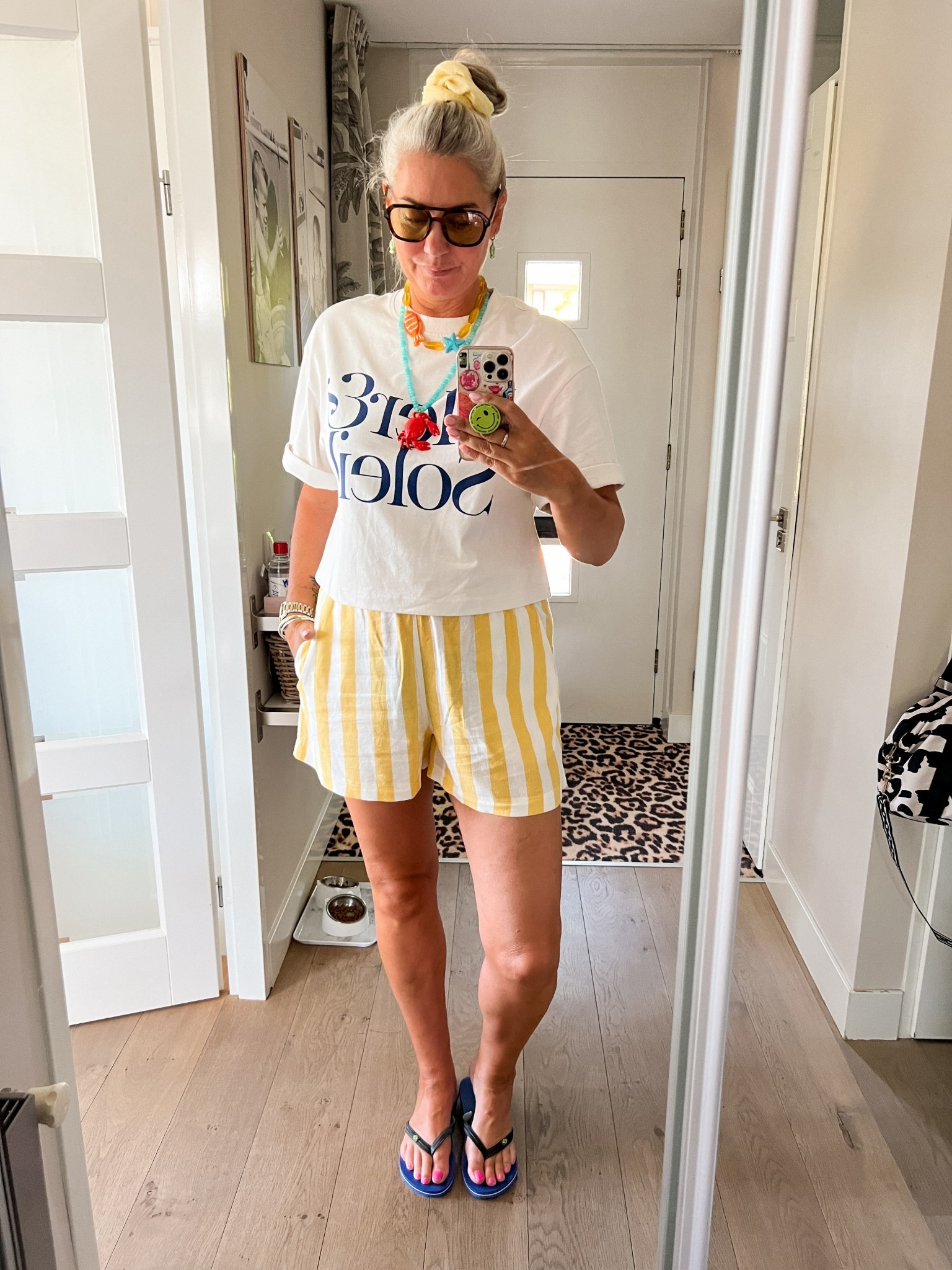 Ootd - Saturday. Yellow striped linen blend shorts paired with a graphic t-shirt, brand inspired sunglasses, crab necklace (Zara), fish necklace (Bijou Brigitte), oversized yellow scrunchie and flip flops. 



#LTKeurope #LTKnederlands #LTKsummer