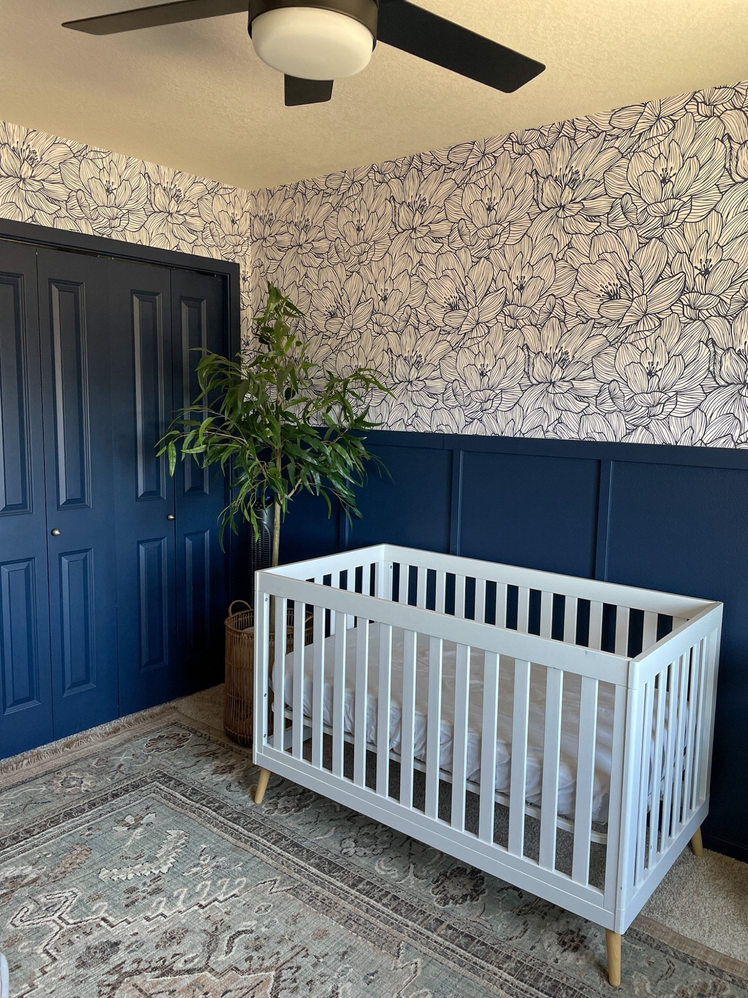 Love the wallpaper with the moody blue trim.

#LTKhome #LTKfamily #LTKbump