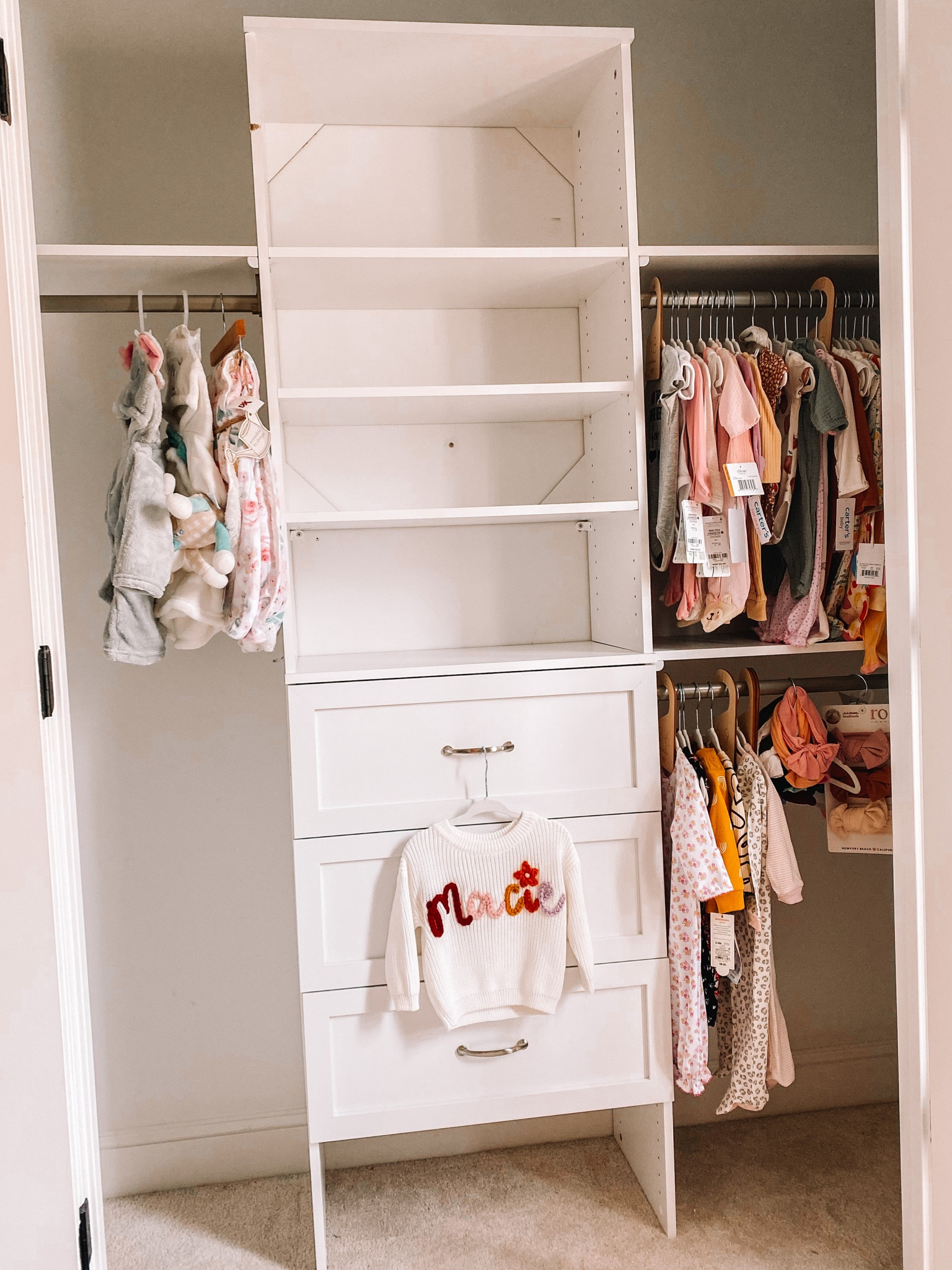 Starting to put baby girls nursery together! Love this closet maid & these felt hangers are amazing! Nursery closet | baby room | baby closet 

#LTKbump #LTKbaby