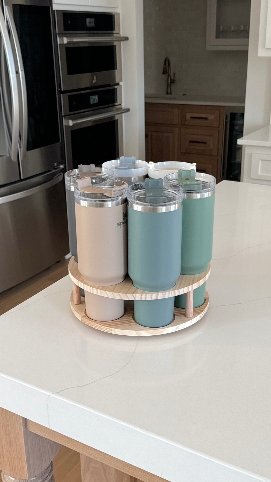 Stanley cup water bottle organizer! Fits other brands of water bottles too! Perfect for an organized kitchen, holds 6 plus one in the middle with no handle!

Amazon home, Amazon home finds, affordable home finds, organization, Amazon organization

#LTKHome